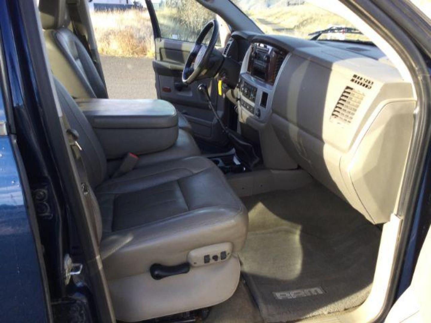 2008 Blue/Gold /Khaki Leather Dodge Ram 3500 Laramie Quad Cab 4WD (3D7MX38A68G) with an 6.7L L6 OHV 24V TURBO DIESEL engine, 6-Speed Manual Transmission transmission, located at 1801 Main Street, Lewiston, 83501, (208) 743-9371, 46.417065, -117.004799 - Photo#8