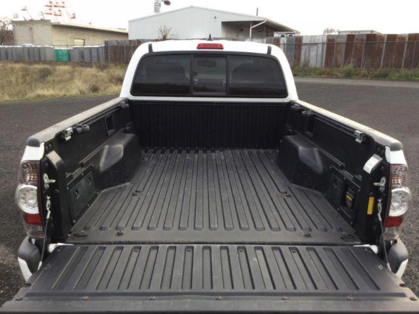 2012 Super White /Graphite Cloth Interior Toyota Tacoma Double Cab Long Bed V6 Auto 4WD (5TFMU4FN6CX) with an 4.0L V6 DOHC 24V engine, 5-Speed Automatic transmission, located at 1801 Main Street, Lewiston, 83501, (208) 743-9371, 46.417065, -117.004799 - Photo#10