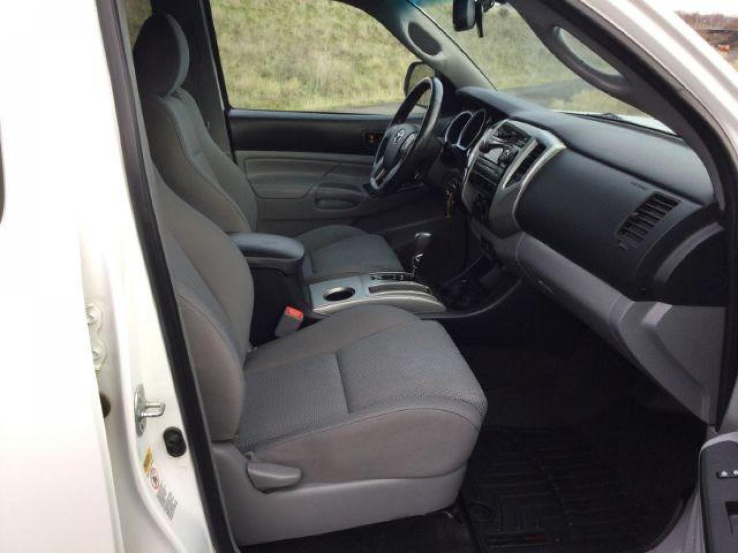 2012 Super White /Graphite Cloth Interior Toyota Tacoma Double Cab Long Bed V6 Auto 4WD (5TFMU4FN6CX) with an 4.0L V6 DOHC 24V engine, 5-Speed Automatic transmission, located at 1801 Main Street, Lewiston, 83501, (208) 743-9371, 46.417065, -117.004799 - Photo#16