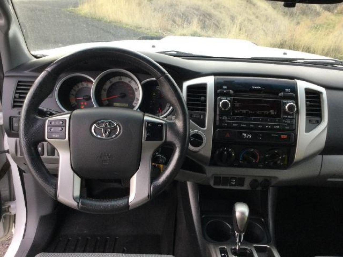 2012 Super White /Graphite Cloth Interior Toyota Tacoma Double Cab Long Bed V6 Auto 4WD (5TFMU4FN6CX) with an 4.0L V6 DOHC 24V engine, 5-Speed Automatic transmission, located at 1801 Main Street, Lewiston, 83501, (208) 743-9371, 46.417065, -117.004799 - Photo#6