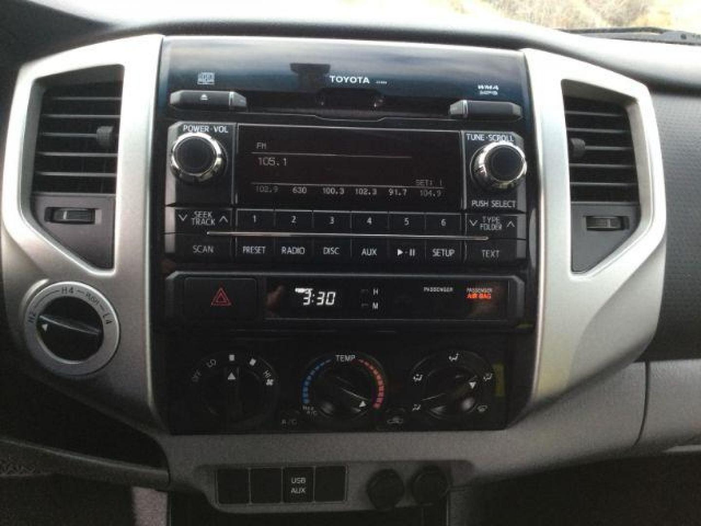 2012 Super White /Graphite Cloth Interior Toyota Tacoma Double Cab Long Bed V6 Auto 4WD (5TFMU4FN6CX) with an 4.0L V6 DOHC 24V engine, 5-Speed Automatic transmission, located at 1801 Main Street, Lewiston, 83501, (208) 743-9371, 46.417065, -117.004799 - Photo#8