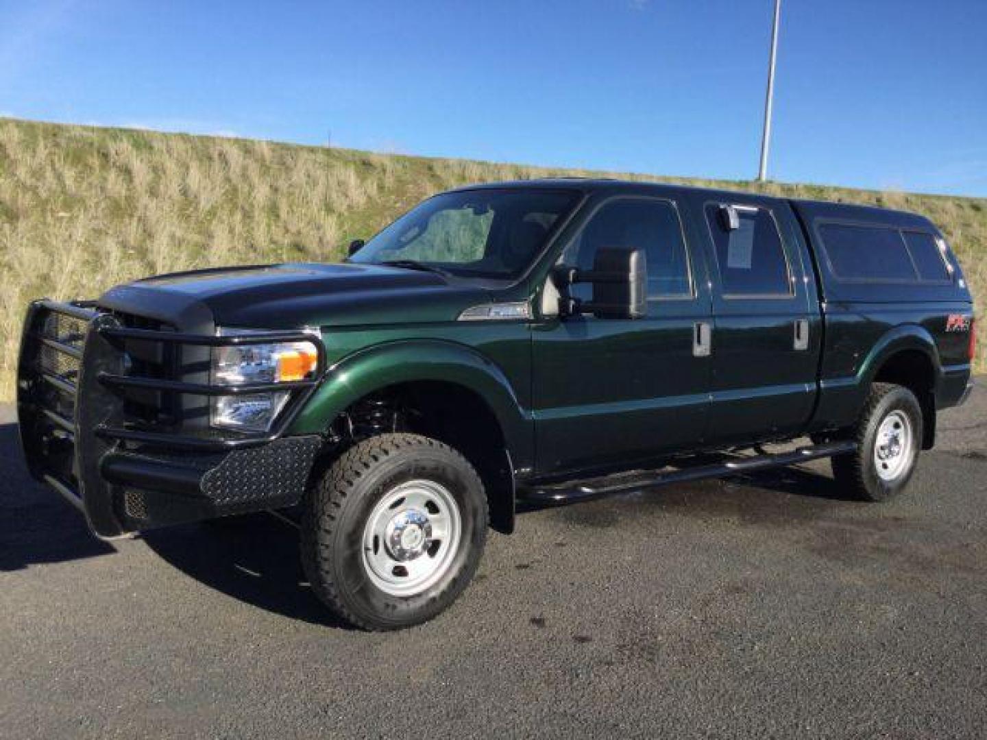 2016 GREEN /Steel, cloth Ford F-350 SD XL Crew Cab 4WD (1FT8W3B67GE) with an 6.2L V8 OHV 16V engine, 6-Speed Automatic transmission, located at 1801 Main Street, Lewiston, 83501, (208) 743-9371, 46.417065, -117.004799 - Photo#0