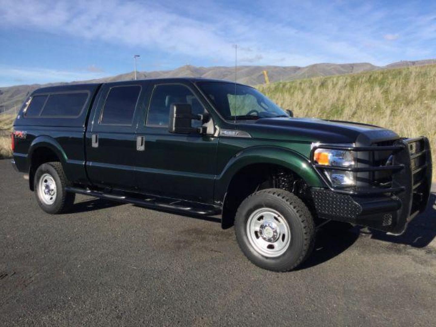 2016 GREEN /Steel, cloth Ford F-350 SD XL Crew Cab 4WD (1FT8W3B67GE) with an 6.2L V8 OHV 16V engine, 6-Speed Automatic transmission, located at 1801 Main Street, Lewiston, 83501, (208) 743-9371, 46.417065, -117.004799 - Photo#9