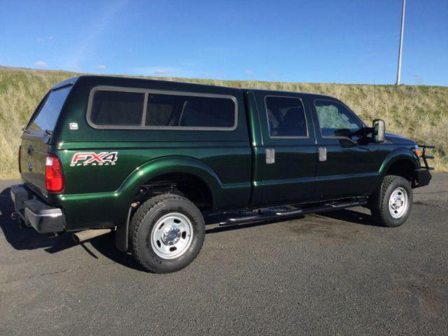 2016 GREEN /Steel, cloth Ford F-350 SD XL Crew Cab 4WD (1FT8W3B67GE) with an 6.2L V8 OHV 16V engine, 6-Speed Automatic transmission, located at 1801 Main Street, Lewiston, 83501, (208) 743-9371, 46.417065, -117.004799 - Photo#11