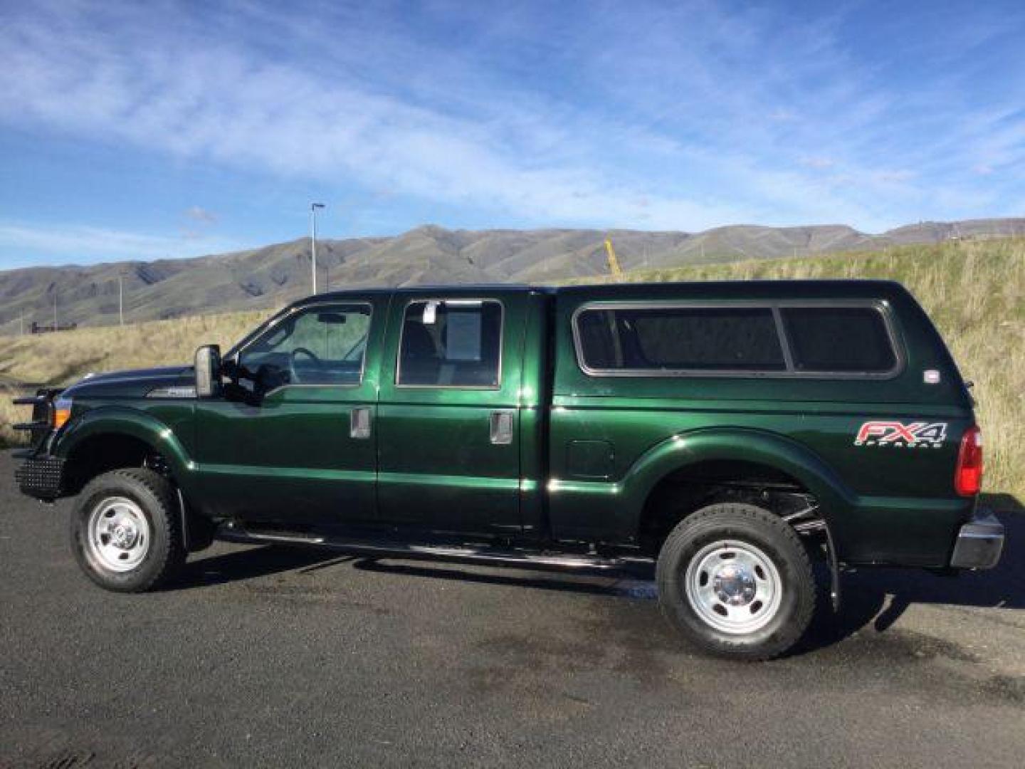 2016 GREEN /Steel, cloth Ford F-350 SD XL Crew Cab 4WD (1FT8W3B67GE) with an 6.2L V8 OHV 16V engine, 6-Speed Automatic transmission, located at 1801 Main Street, Lewiston, 83501, (208) 743-9371, 46.417065, -117.004799 - Photo#1