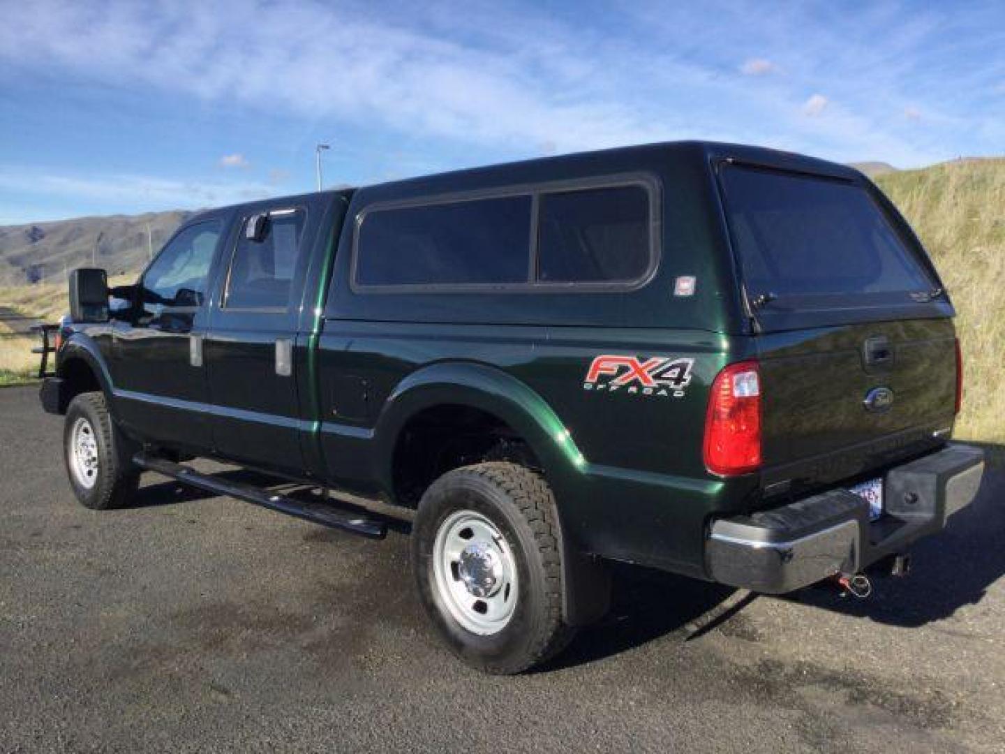 2016 GREEN /Steel, cloth Ford F-350 SD XL Crew Cab 4WD (1FT8W3B67GE) with an 6.2L V8 OHV 16V engine, 6-Speed Automatic transmission, located at 1801 Main Street, Lewiston, 83501, (208) 743-9371, 46.417065, -117.004799 - Photo#2