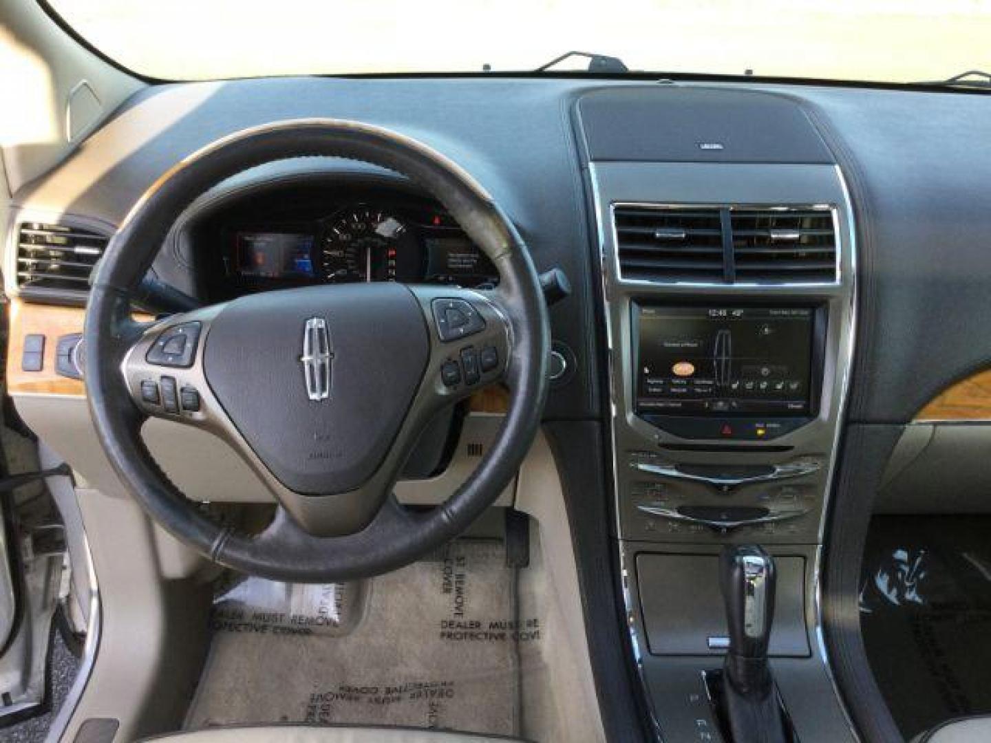 2014 Ingot Silver Metallic /Light Stone w/Gray Piping Lincoln MKX AWD (2LMDJ8JK5EB) with an 3.7L V6 DOHC 24V engine, 6-Speed Automatic transmission, located at 1801 Main Street, Lewiston, 83501, (208) 743-9371, 46.417065, -117.004799 - Photo#12