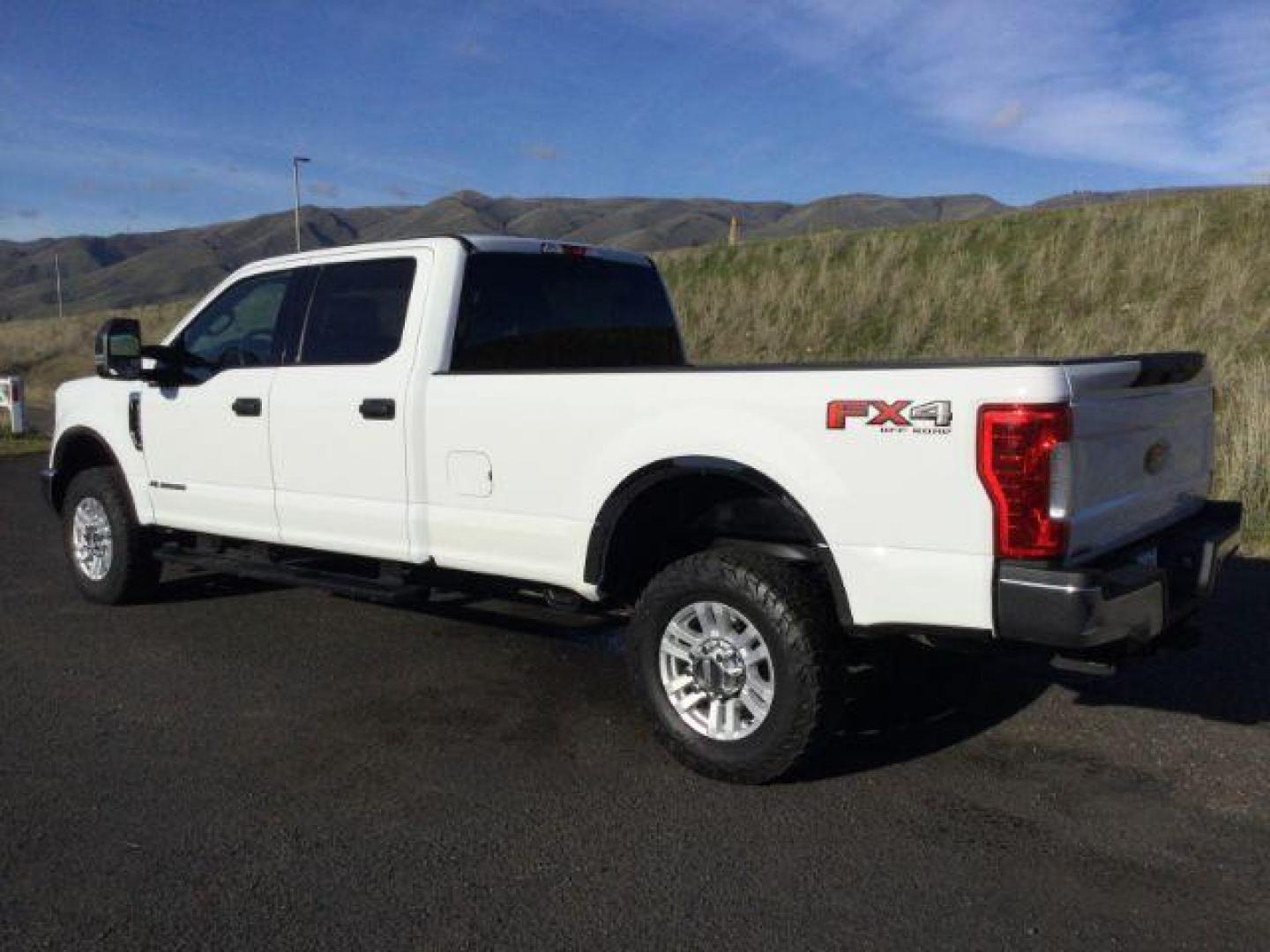 2019 Oxford White /Medium Earth Gray, cloth Ford F-350 SD XLT Crew Cab Long Bed 4WD (1FT8W3BT5KE) with an 6.7L V8 OHV 16V DIESEL engine, 6-Speed Automatic transmission, located at 1801 Main Street, Lewiston, 83501, (208) 743-9371, 46.417065, -117.004799 - Photo#2