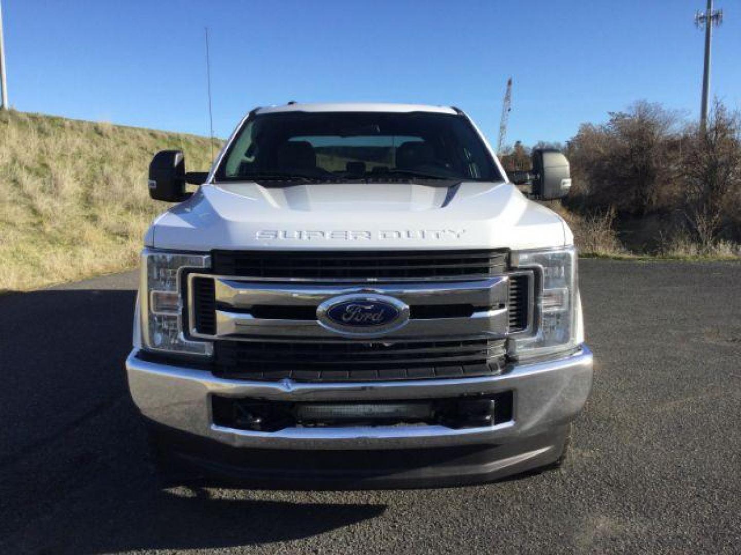 2019 Oxford White /Medium Earth Gray, cloth Ford F-350 SD XLT Crew Cab Long Bed 4WD (1FT8W3BT5KE) with an 6.7L V8 OHV 16V DIESEL engine, 6-Speed Automatic transmission, located at 1801 Main Street, Lewiston, 83501, (208) 743-9371, 46.417065, -117.004799 - Photo#3