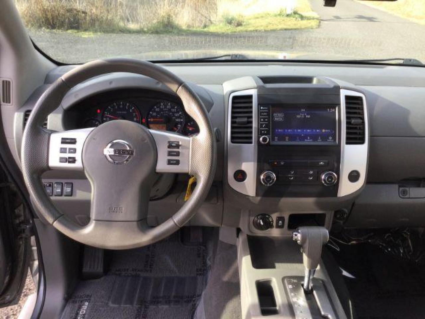 2019 Gun Metallic /gray cloth Nissan Frontier SV Crew Cab 4x4 (1N6AD0EV8KN) with an 4.0L V6 DOHC 24V engine, 5-Speed Automatic transmission, located at 1801 Main Street, Lewiston, 83501, (208) 743-9371, 46.417065, -117.004799 - Photo#5