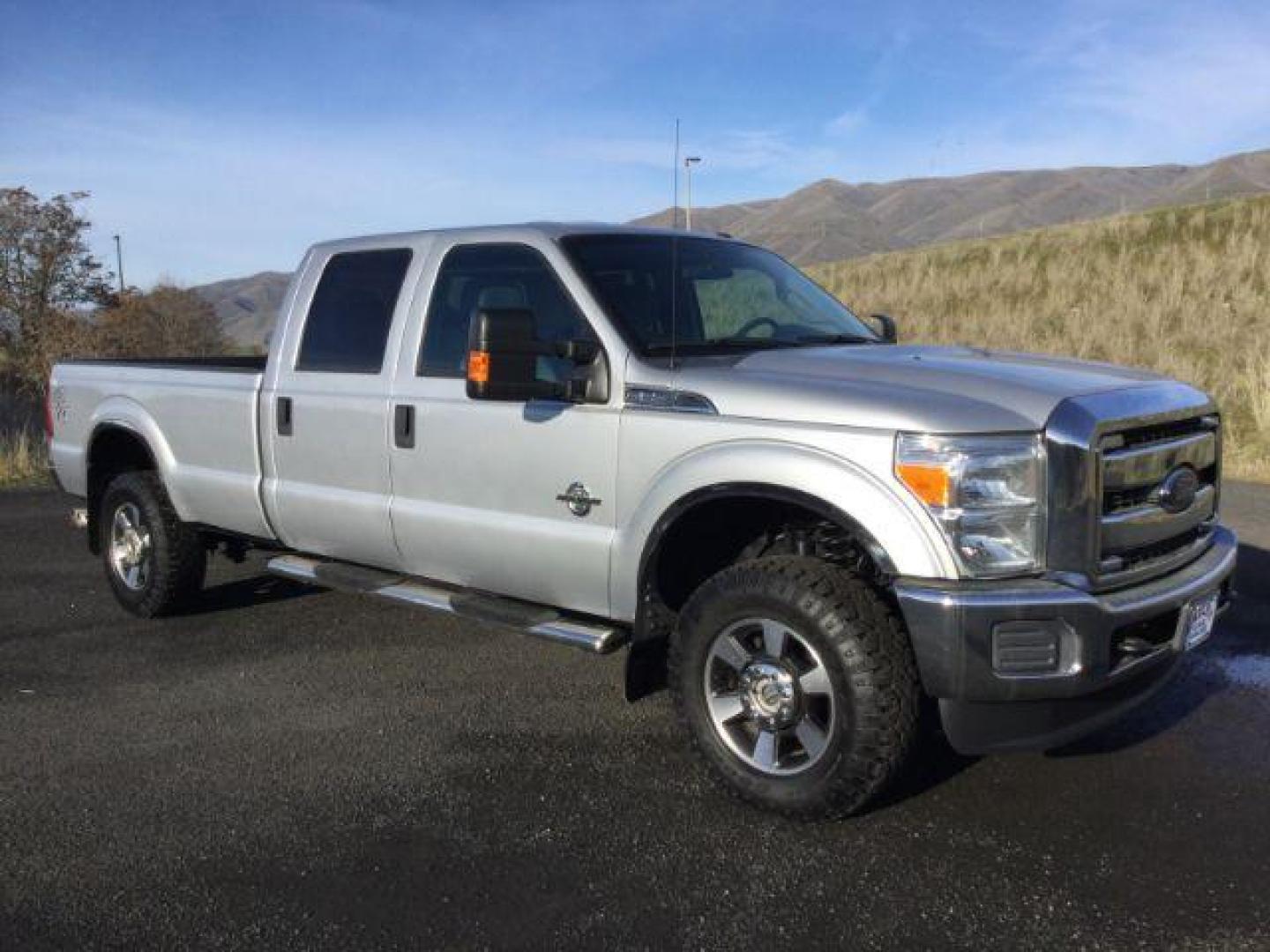 2015 Ingot Silver Metallic /Steel Ford F-350 SD XLT Crew Cab 4WD (1FT8W3BT5FE) with an 6.7L V8 OHV 16V DIESEL engine, 6-Speed Automatic transmission, located at 1801 Main Street, Lewiston, 83501, (208) 743-9371, 46.417065, -117.004799 - Photo#0