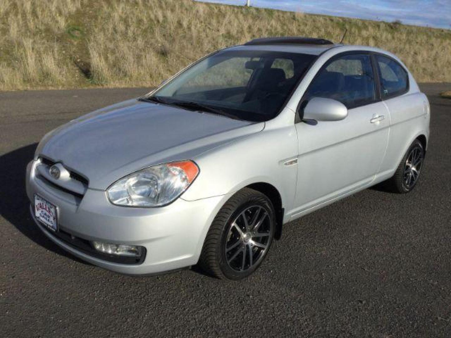 2008 Platinum Silver Metallic /Black Cloth Interior Hyundai Accent SE 3-Door (KMHCN36C88U) with an 1.6L L4 DOHC 16V engine, 5-Speed Manual transmission, located at 1801 Main Street, Lewiston, 83501, (208) 743-9371, 46.417065, -117.004799 - Photo#0