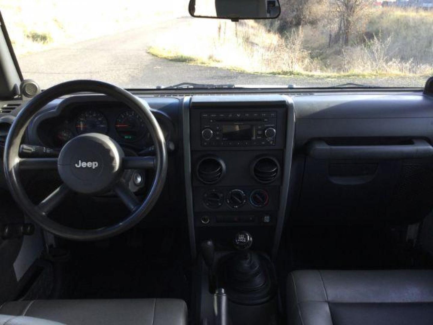 2008 Bright Silver Metallic with Black Hard Top /Dark Slate Gray/Medium Slate Gray Vinyl Interior Jeep Wrangler X (1J4FA24188L) with an 3.8L V6 OHV 12V engine, 6-Speed Manual transmission, located at 1801 Main Street, Lewiston, 83501, (208) 743-9371, 46.417065, -117.004799 - Photo#18