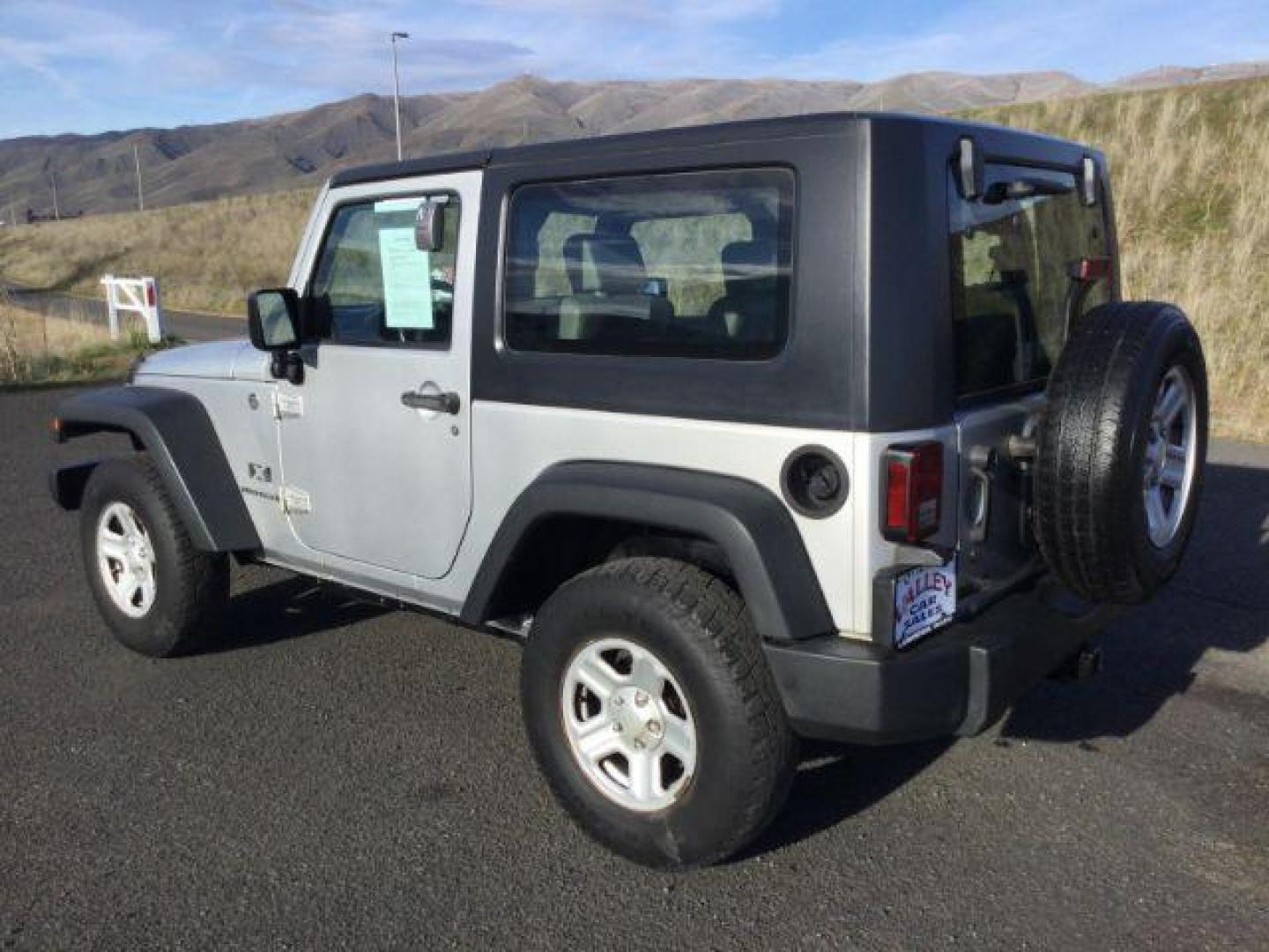 2008 Bright Silver Metallic with Black Hard Top /Dark Slate Gray/Medium Slate Gray Vinyl Interior Jeep Wrangler X (1J4FA24188L) with an 3.8L V6 OHV 12V engine, 6-Speed Manual transmission, located at 1801 Main Street, Lewiston, 83501, (208) 743-9371, 46.417065, -117.004799 - Photo#2