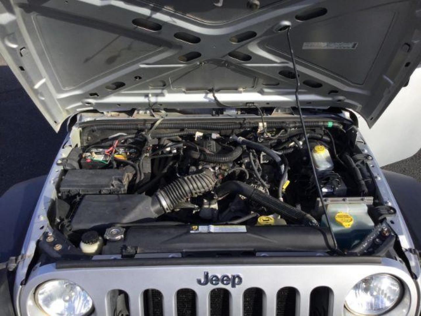 2008 Bright Silver Metallic with Black Hard Top /Dark Slate Gray/Medium Slate Gray Vinyl Interior Jeep Wrangler X (1J4FA24188L) with an 3.8L V6 OHV 12V engine, 6-Speed Manual transmission, located at 1801 Main Street, Lewiston, 83501, (208) 743-9371, 46.417065, -117.004799 - Photo#8