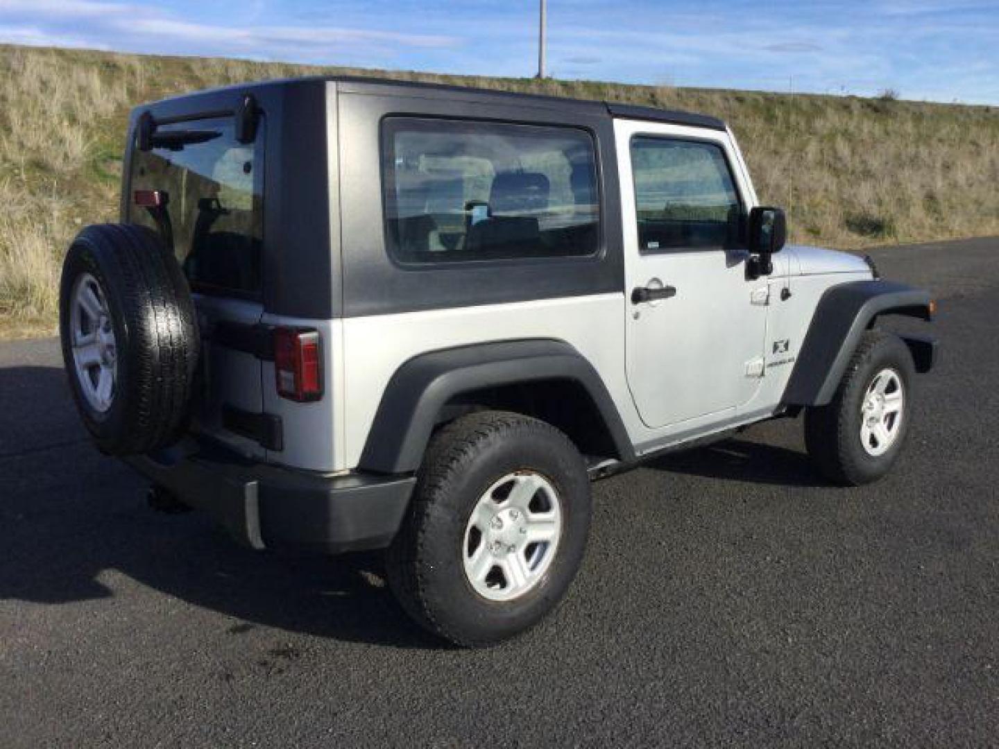 2008 Bright Silver Metallic with Black Hard Top /Dark Slate Gray/Medium Slate Gray Vinyl Interior Jeep Wrangler X (1J4FA24188L) with an 3.8L V6 OHV 12V engine, 6-Speed Manual transmission, located at 1801 Main Street, Lewiston, 83501, (208) 743-9371, 46.417065, -117.004799 - Photo#14