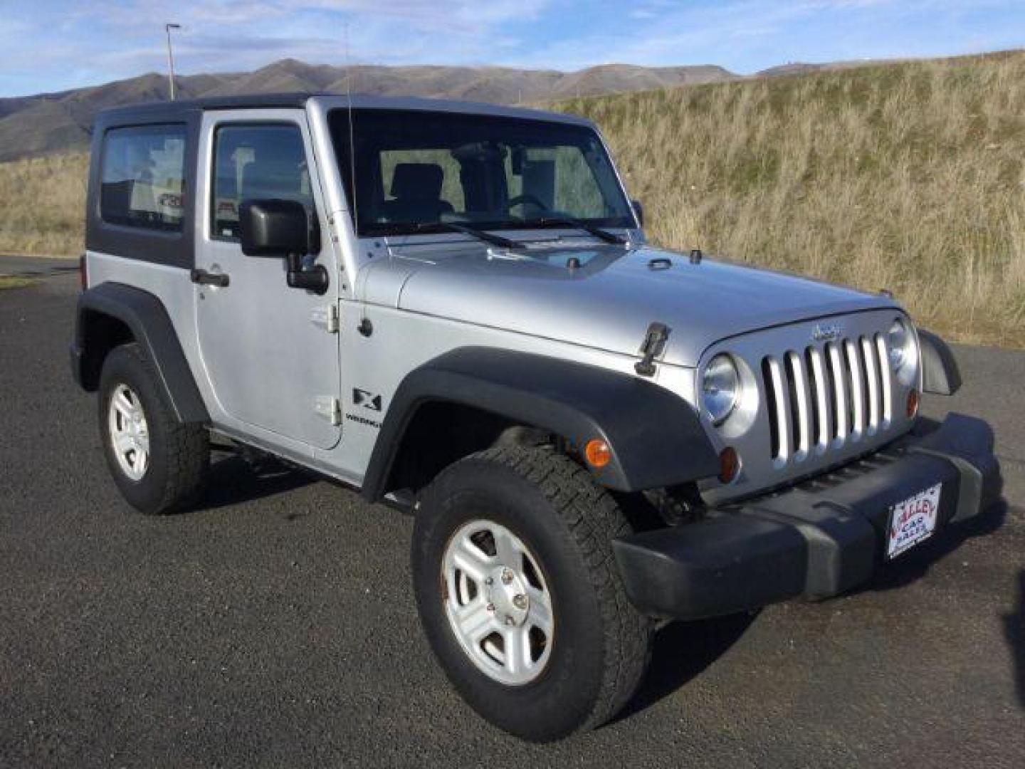 2008 Bright Silver Metallic with Black Hard Top /Dark Slate Gray/Medium Slate Gray Vinyl Interior Jeep Wrangler X (1J4FA24188L) with an 3.8L V6 OHV 12V engine, 6-Speed Manual transmission, located at 1801 Main Street, Lewiston, 83501, (208) 743-9371, 46.417065, -117.004799 - Photo#15