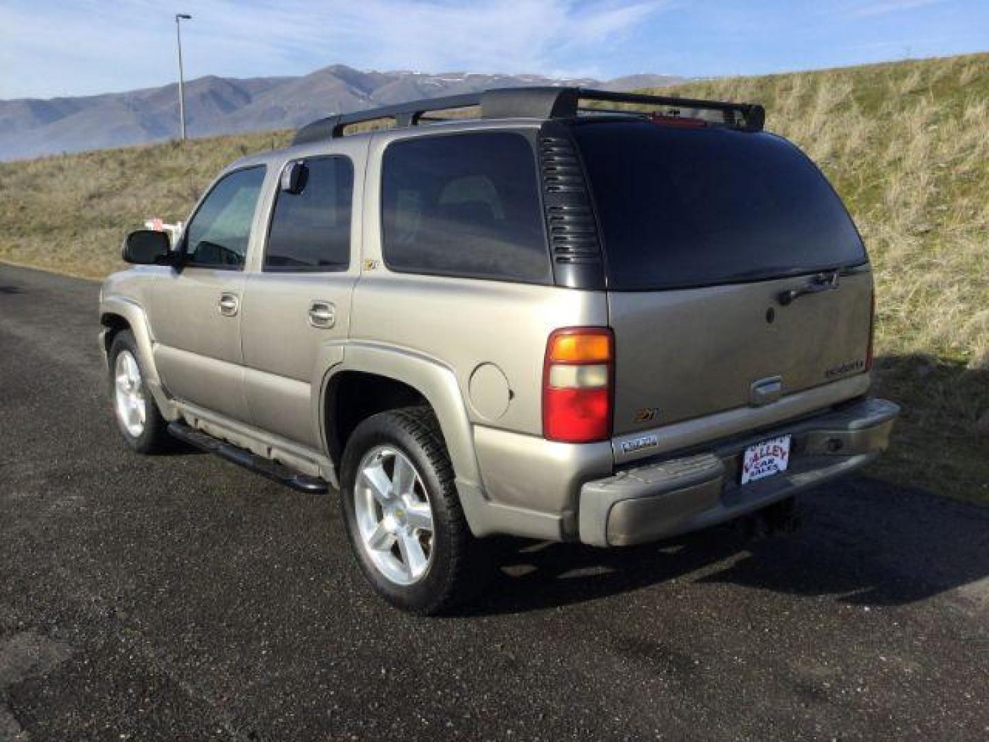 2003 Light Pewter Metallic /Tan/Neutral Leather Interior Chevrolet Tahoe 4WD (1GNEK13Z43R) with an 5.3L V8 OHV 16V FFV engine, 4-Speed Automatic transmission, located at 1801 Main Street, Lewiston, 83501, (208) 743-9371, 46.417065, -117.004799 - Photo#2