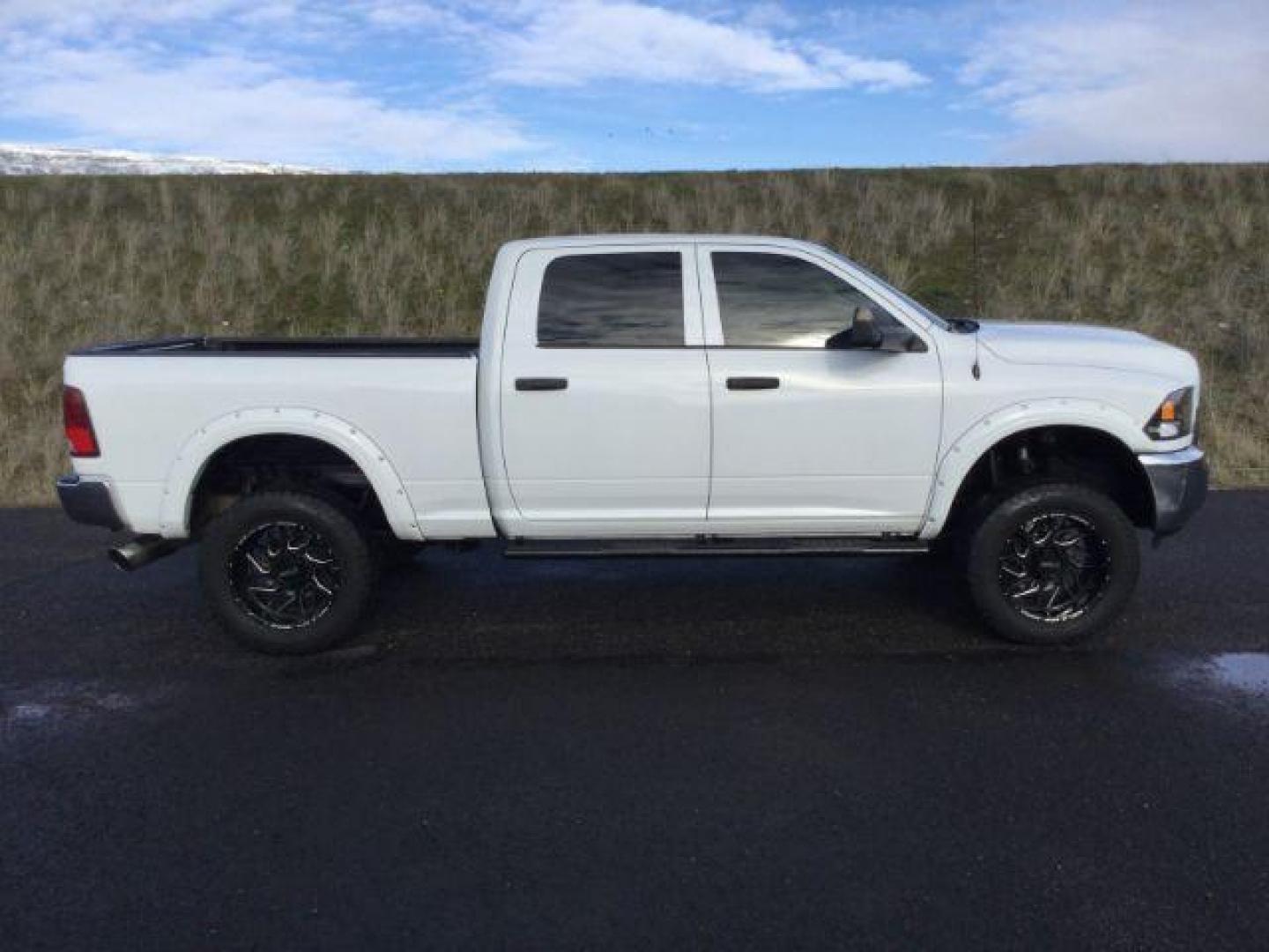 2016 Bright White Clear Coat /BLACK LEATHER RAM 2500 Tradesman Crew Cab SWB 4WD (3C6UR5CL7GG) with an 6.7L L6 OHV 24V TURBO DIESEL engine, 6-Speed Automatic transmission, located at 1801 Main Street, Lewiston, 83501, (208) 743-9371, 46.417065, -117.004799 - Photo#11