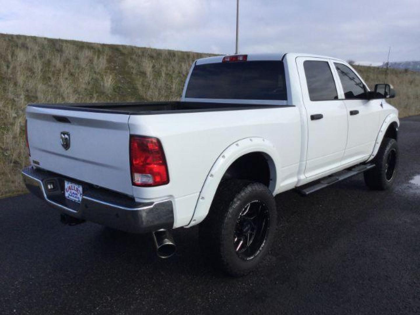 2016 Bright White Clear Coat /BLACK LEATHER RAM 2500 Tradesman Crew Cab SWB 4WD (3C6UR5CL7GG) with an 6.7L L6 OHV 24V TURBO DIESEL engine, 6-Speed Automatic transmission, located at 1801 Main Street, Lewiston, 83501, (208) 743-9371, 46.417065, -117.004799 - Photo#12