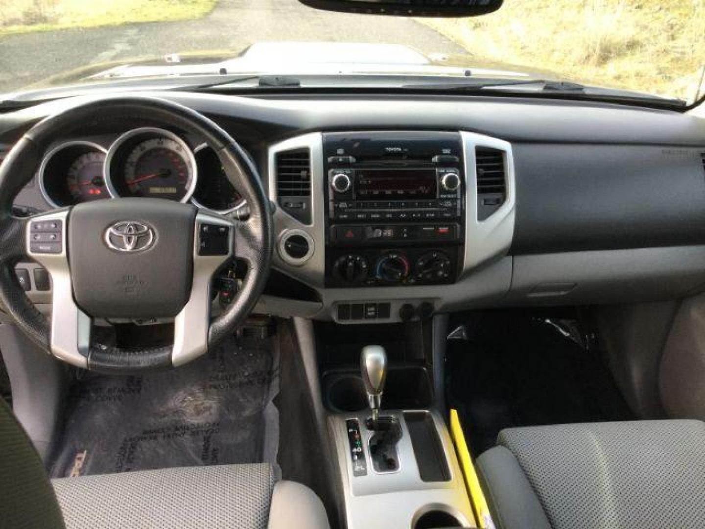 2012 Black /Graphite Cloth Interior Toyota Tacoma Double Cab Long Bed V6 Auto 4WD (3TMMU4FN1CM) with an 4.0L V6 DOHC 24V engine, 5-Speed Automatic transmission, located at 1801 Main Street, Lewiston, 83501, (208) 743-9371, 46.417065, -117.004799 - Photo#9