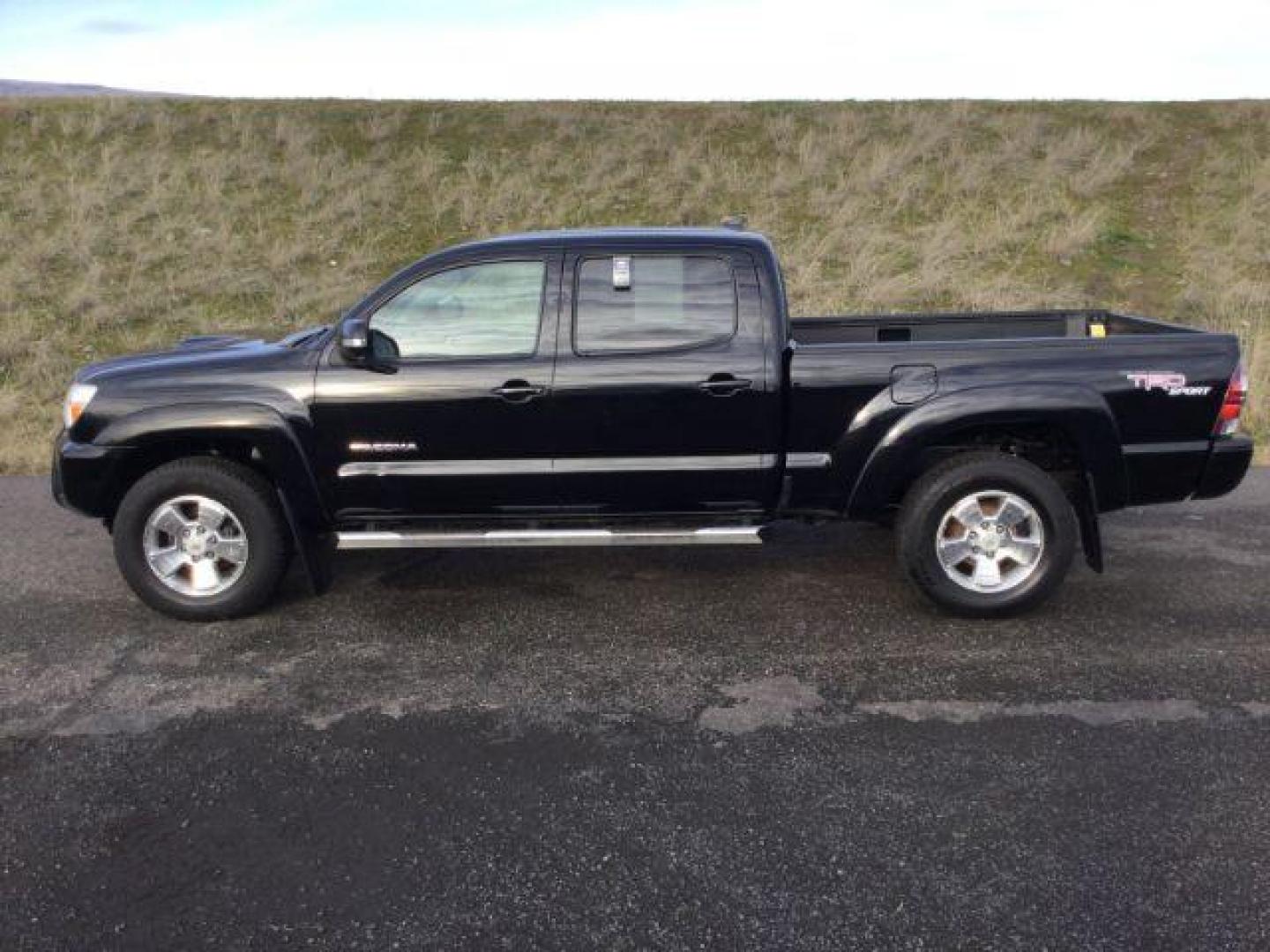 2012 Black /Graphite Cloth Interior Toyota Tacoma Double Cab Long Bed V6 Auto 4WD (3TMMU4FN1CM) with an 4.0L V6 DOHC 24V engine, 5-Speed Automatic transmission, located at 1801 Main Street, Lewiston, 83501, (208) 743-9371, 46.417065, -117.004799 - Photo#1