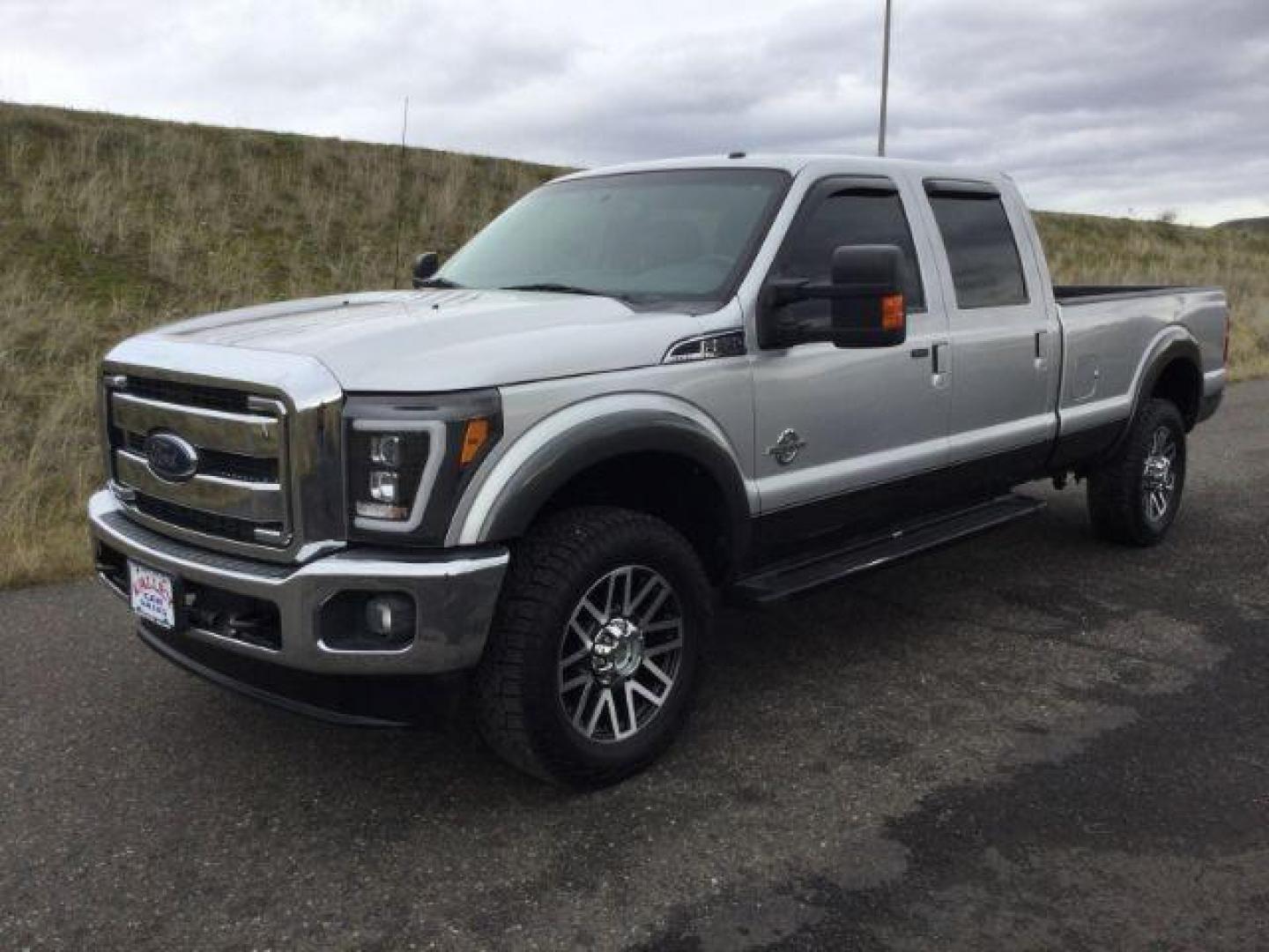 2016 SILVER/GRAY /BLACK LEATHER Ford F-350 SD Lariat Crew Cab Long Bed 4WD (1FT8W3BT3GE) with an 6.7L V8 OHV 16V DIESEL engine, 6-Speed Automatic transmission, located at 1801 Main Street, Lewiston, 83501, (208) 743-9371, 46.417065, -117.004799 - Photo#0