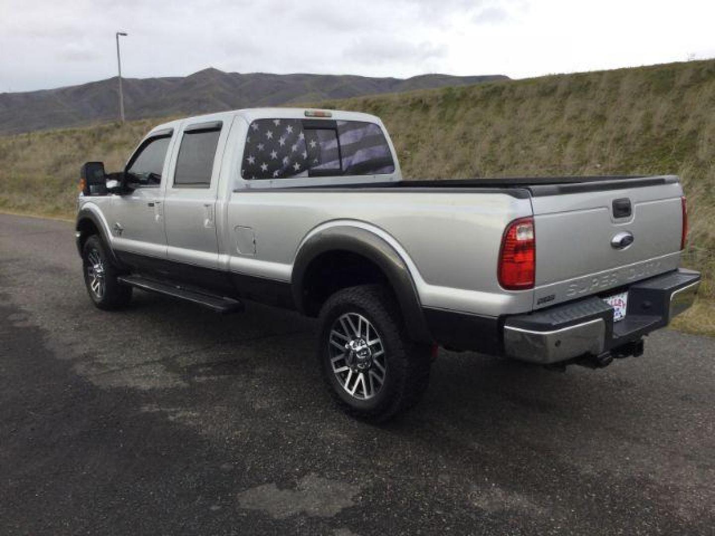 2016 SILVER/GRAY /BLACK LEATHER Ford F-350 SD Lariat Crew Cab Long Bed 4WD (1FT8W3BT3GE) with an 6.7L V8 OHV 16V DIESEL engine, 6-Speed Automatic transmission, located at 1801 Main Street, Lewiston, 83501, (208) 743-9371, 46.417065, -117.004799 - Photo#2