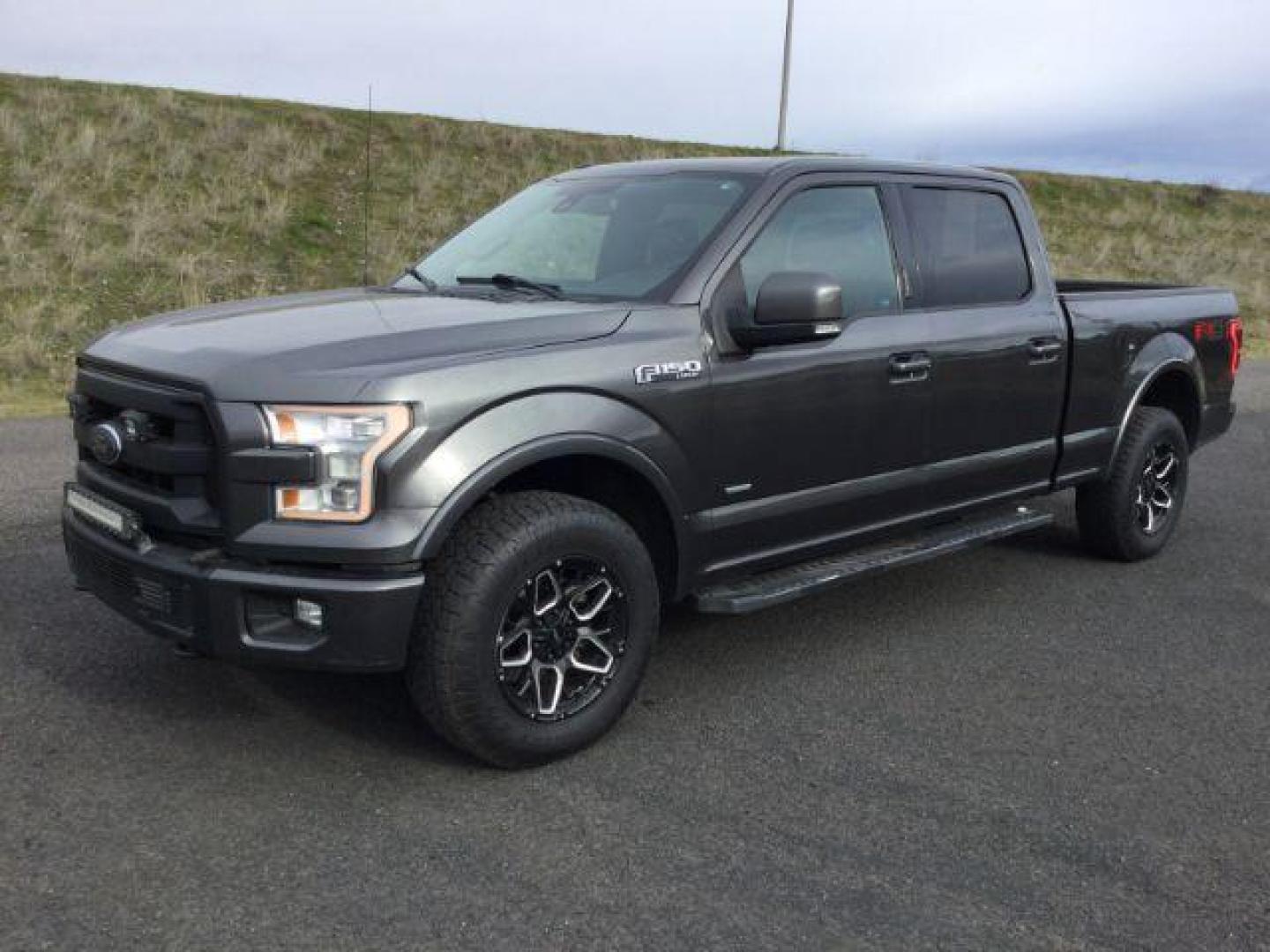 2015 Magnetic Metallic /BLACK LEATHER Ford F-150 Lariat SuperCrew 6.5-ft. Bed 4WD (1FTFW1EG6FF) with an 3.5 V6 engine, 6-Speed Automatic transmission, located at 1801 Main Street, Lewiston, 83501, (208) 743-9371, 46.417065, -117.004799 - Photo#0