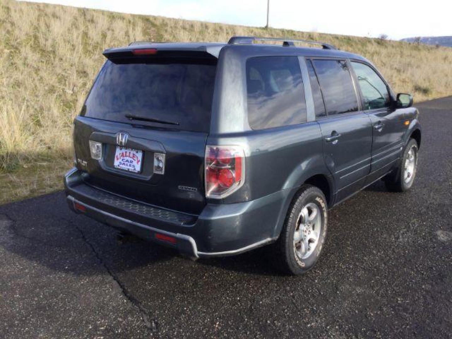 2006 Steel Blue Metallic /Gray Cloth Interior Honda Pilot EX 4WD (2HKYF18426H) with an 3.5L V6 SOHC 24V engine, 5-Speed Automatic transmission, located at 1801 Main Street, Lewiston, 83501, (208) 743-9371, 46.417065, -117.004799 - Photo#9