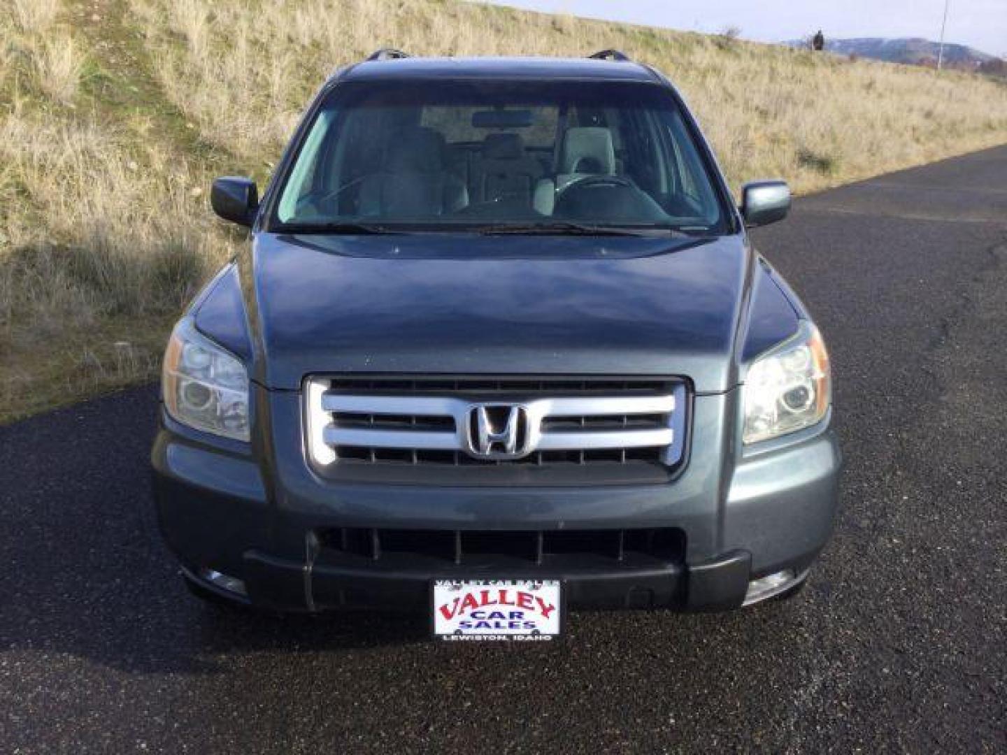 2006 Steel Blue Metallic /Gray Cloth Interior Honda Pilot EX 4WD (2HKYF18426H) with an 3.5L V6 SOHC 24V engine, 5-Speed Automatic transmission, located at 1801 Main Street, Lewiston, 83501, (208) 743-9371, 46.417065, -117.004799 - Photo#8