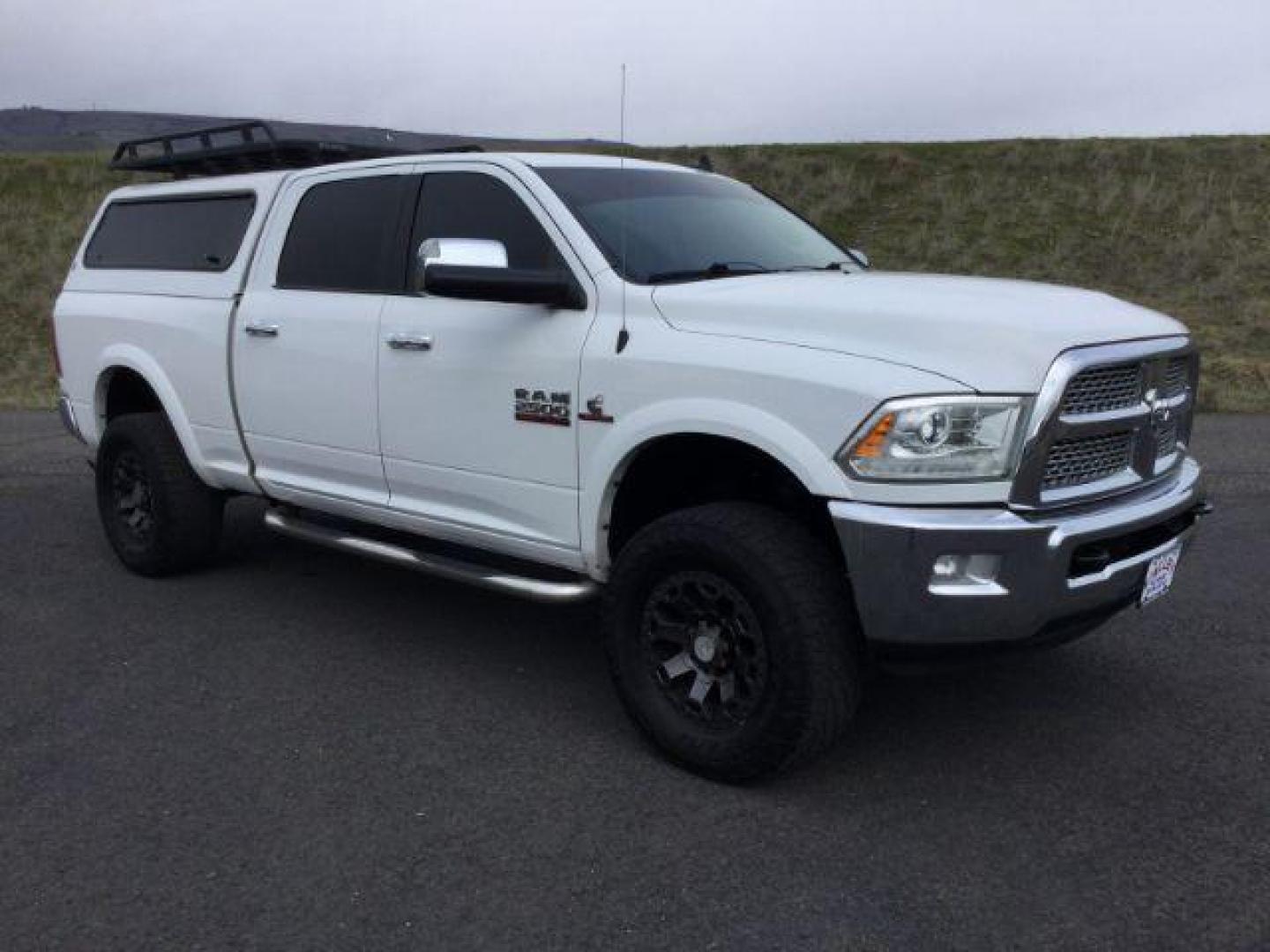 2015 Bright White Clear Coat /BLACK LEATHER RAM 2500 Laramie Crew Cab SWB 4WD (3C6UR5FL4FG) with an 6.7L L6 OHV 24V TURBO DIESEL engine, 6-Speed Automatic transmission, located at 1801 Main Street, Lewiston, 83501, (208) 743-9371, 46.417065, -117.004799 - Photo#14