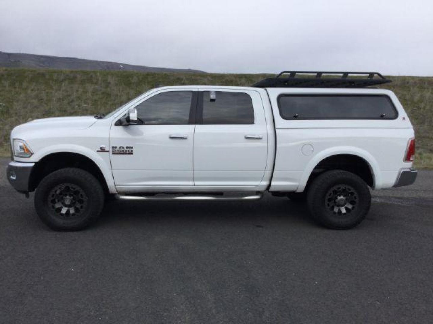 2015 Bright White Clear Coat /BLACK LEATHER RAM 2500 Laramie Crew Cab SWB 4WD (3C6UR5FL4FG) with an 6.7L L6 OHV 24V TURBO DIESEL engine, 6-Speed Automatic transmission, located at 1801 Main Street, Lewiston, 83501, (208) 743-9371, 46.417065, -117.004799 - Photo#1