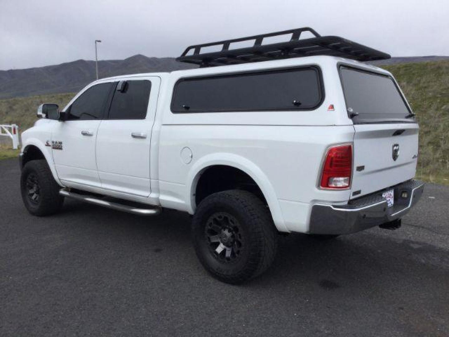 2015 Bright White Clear Coat /BLACK LEATHER RAM 2500 Laramie Crew Cab SWB 4WD (3C6UR5FL4FG) with an 6.7L L6 OHV 24V TURBO DIESEL engine, 6-Speed Automatic transmission, located at 1801 Main Street, Lewiston, 83501, (208) 743-9371, 46.417065, -117.004799 - Photo#2