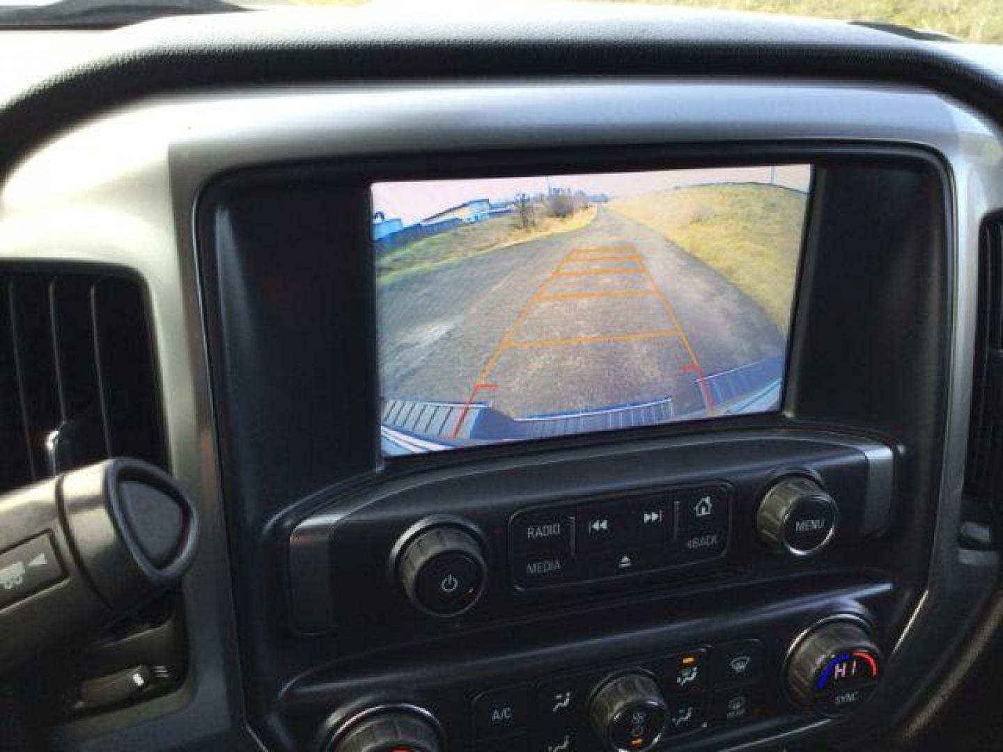 2017 Summit White /Jet Black, cloth Chevrolet Silverado 3500HD LT Crew Cab 4WD (1GC4KZCG9HF) with an 6.0L V8 OHV 16V FFV engine, 6-Speed Automatic transmission, located at 1801 Main Street, Lewiston, 83501, (208) 743-9371, 46.417065, -117.004799 - Photo#12