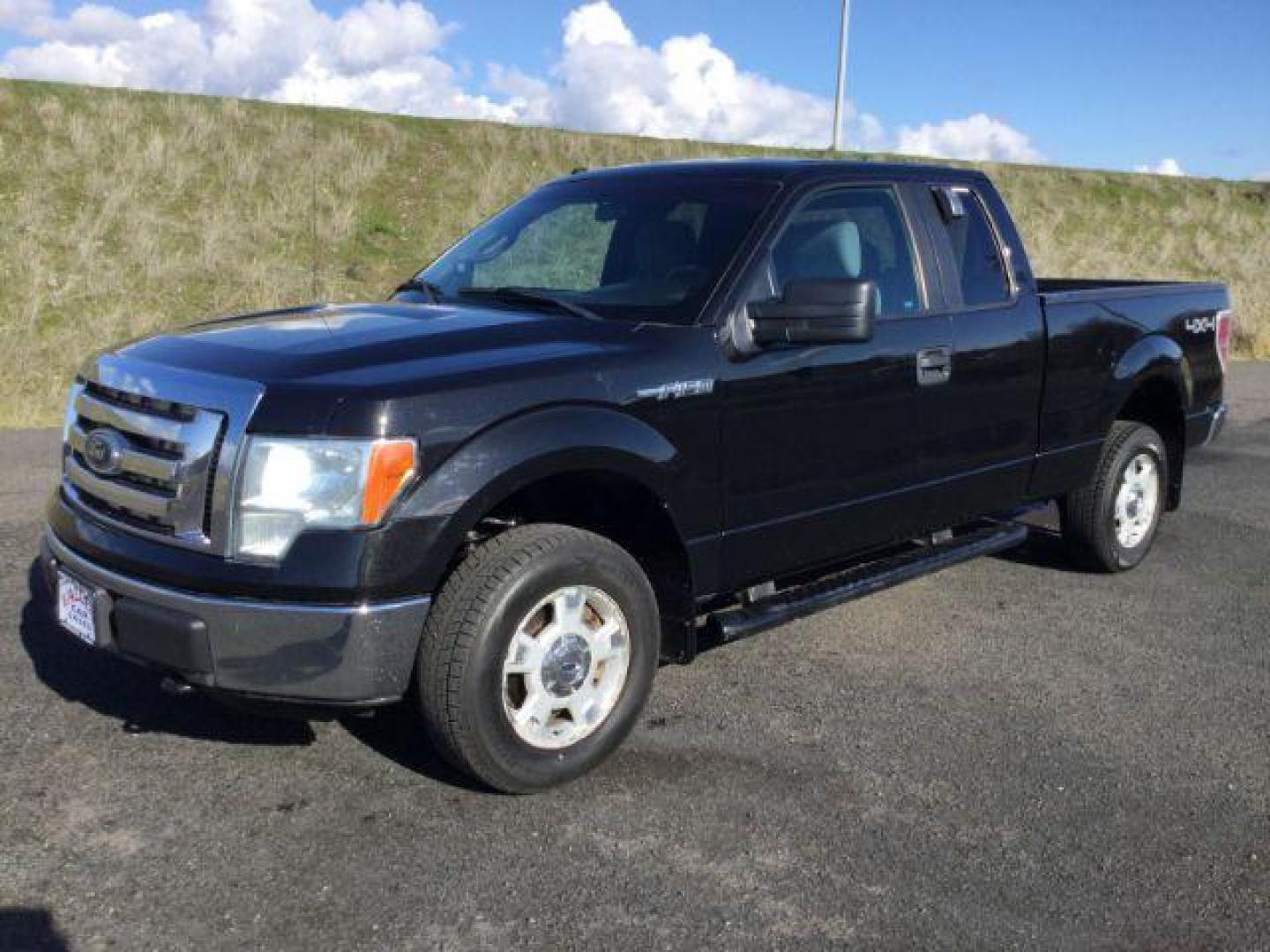 2012 Tuxedo Black Metallic /Steel Gray Cloth Interior Ford F-150 XLT SuperCab 6.5-ft. Bed 4WD (1FTFX1EF5CF) with an 5.0L V8 engine, 6-Speed Automatic transmission, located at 1801 Main Street, Lewiston, 83501, (208) 743-9371, 46.417065, -117.004799 - Photo#0