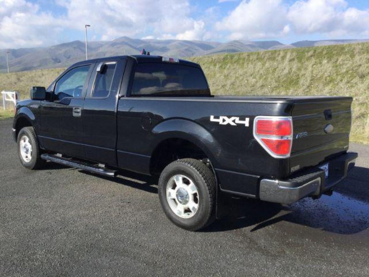 2012 Tuxedo Black Metallic /Steel Gray Cloth Interior Ford F-150 XLT SuperCab 6.5-ft. Bed 4WD (1FTFX1EF5CF) with an 5.0L V8 engine, 6-Speed Automatic transmission, located at 1801 Main Street, Lewiston, 83501, (208) 743-9371, 46.417065, -117.004799 - Photo#2