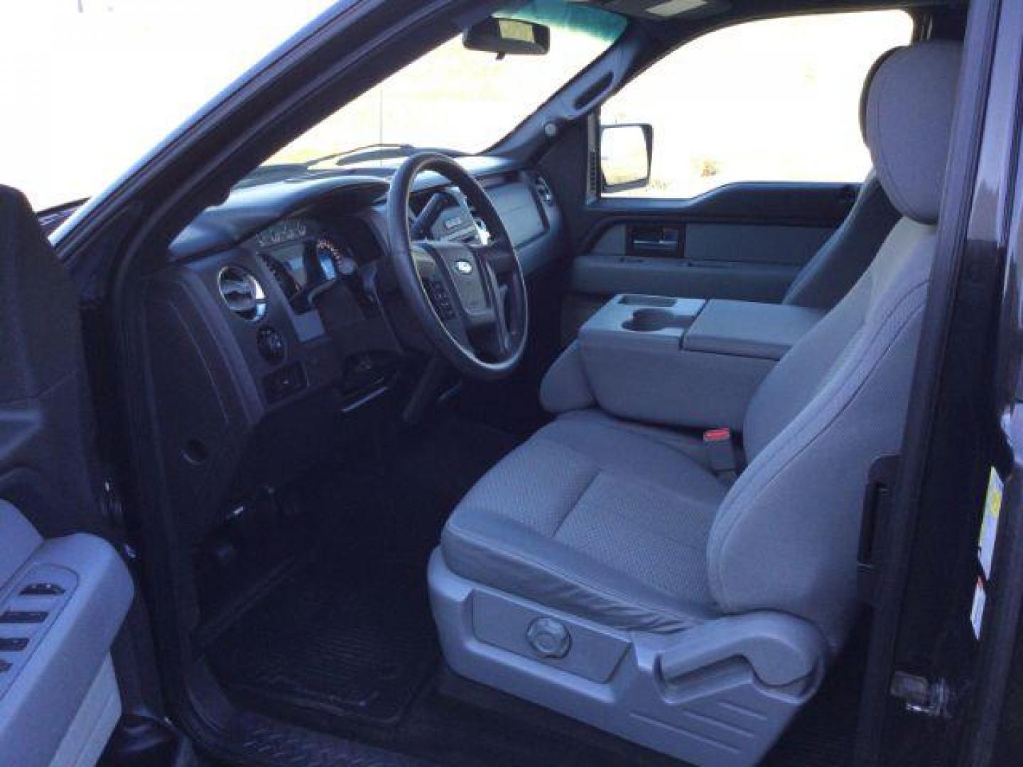 2012 Tuxedo Black Metallic /Steel Gray Cloth Interior Ford F-150 XLT SuperCab 6.5-ft. Bed 4WD (1FTFX1EF5CF) with an 5.0L V8 engine, 6-Speed Automatic transmission, located at 1801 Main Street, Lewiston, 83501, (208) 743-9371, 46.417065, -117.004799 - Photo#3