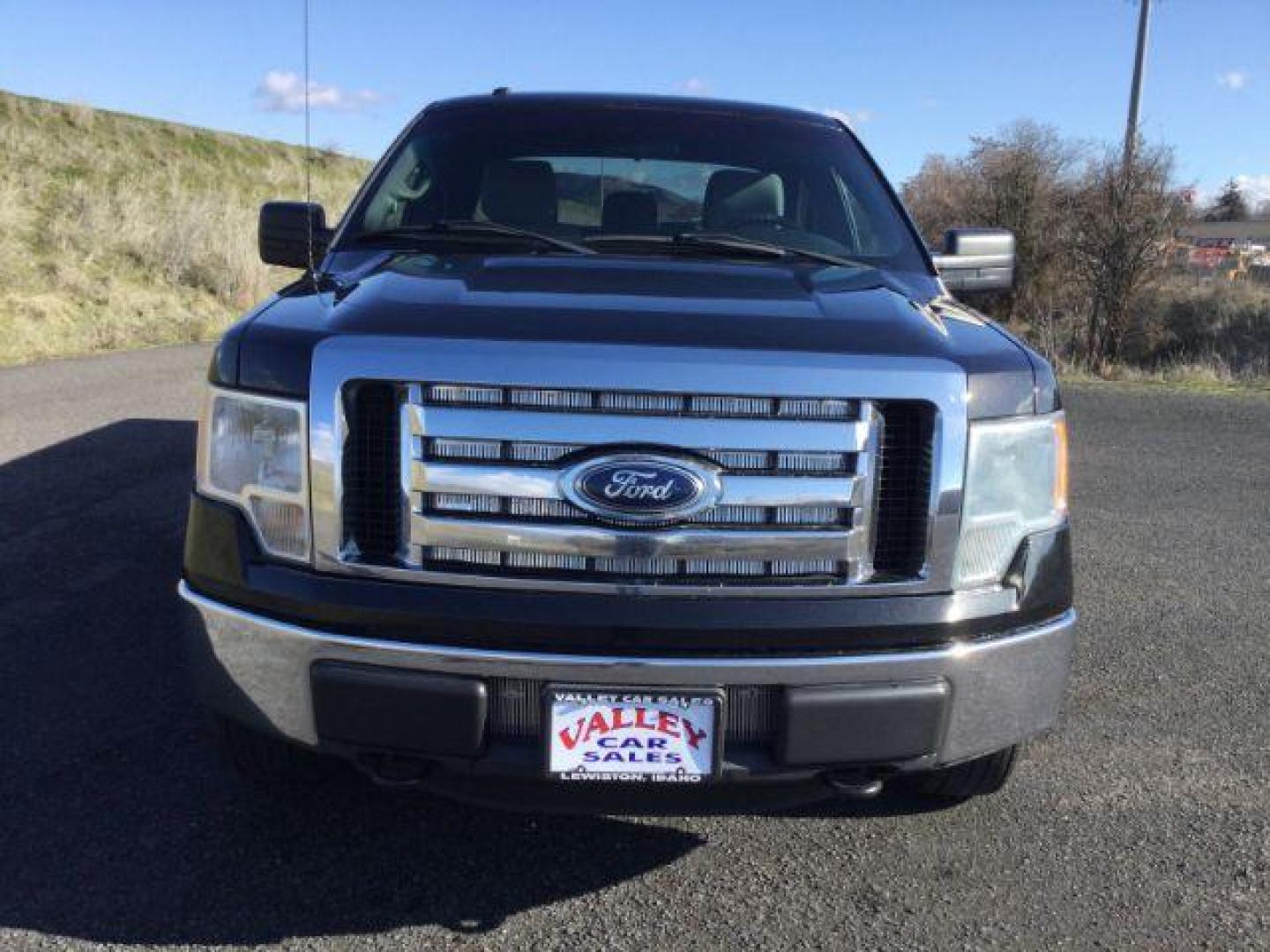 2012 Tuxedo Black Metallic /Steel Gray Cloth Interior Ford F-150 XLT SuperCab 6.5-ft. Bed 4WD (1FTFX1EF5CF) with an 5.0L V8 engine, 6-Speed Automatic transmission, located at 1801 Main Street, Lewiston, 83501, (208) 743-9371, 46.417065, -117.004799 - Photo#6