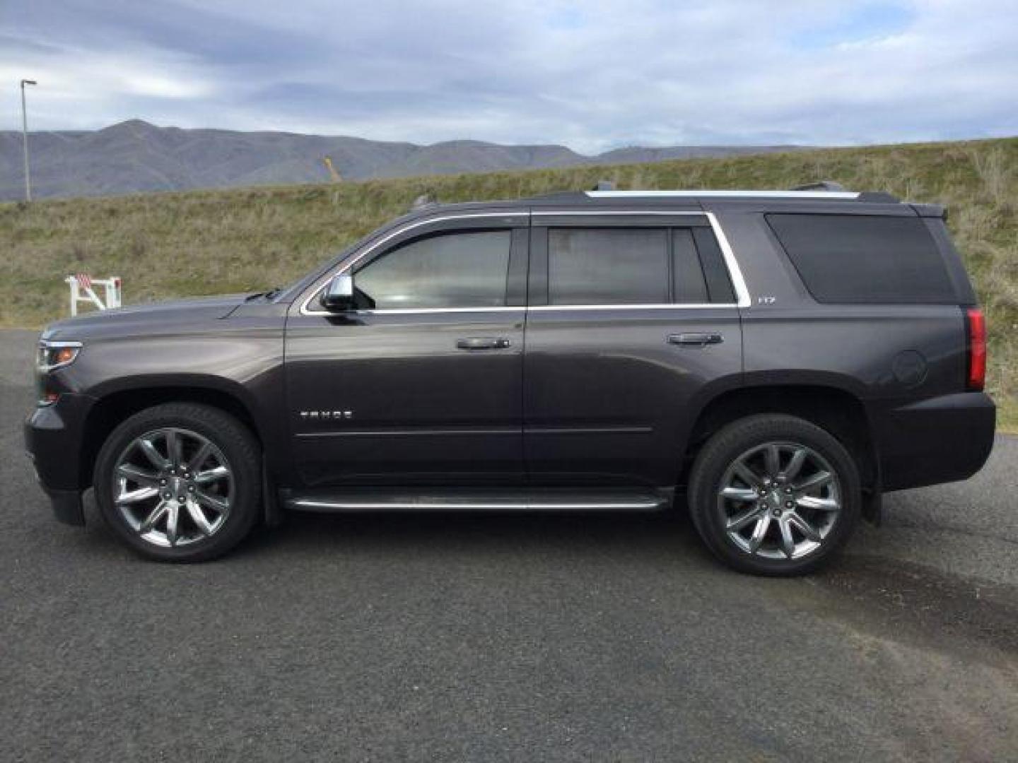 2015 GRAY /BLACK LEATHER Chevrolet Tahoe LTZ 4WD (1GNSKCKC9FR) with an 5.3L V8 OHV 16V engine, 6-Speed Automatic transmission, located at 1801 Main Street, Lewiston, 83501, (208) 743-9371, 46.417065, -117.004799 - Photo#1