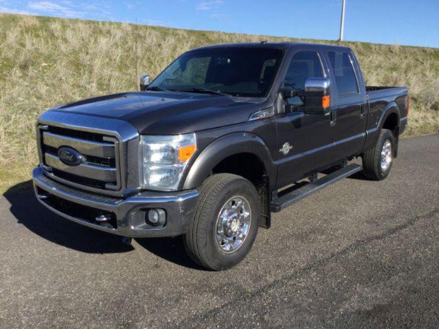 2016 GRAY /BLACK LEATHER Ford F-350 SD Lariat Crew Cab 4WD (1FT8W3BT3GE) with an 6.7L V8 OHV 16V DIESEL engine, 6-Speed Automatic transmission, located at 1801 Main Street, Lewiston, 83501, (208) 743-9371, 46.417065, -117.004799 - Photo#0