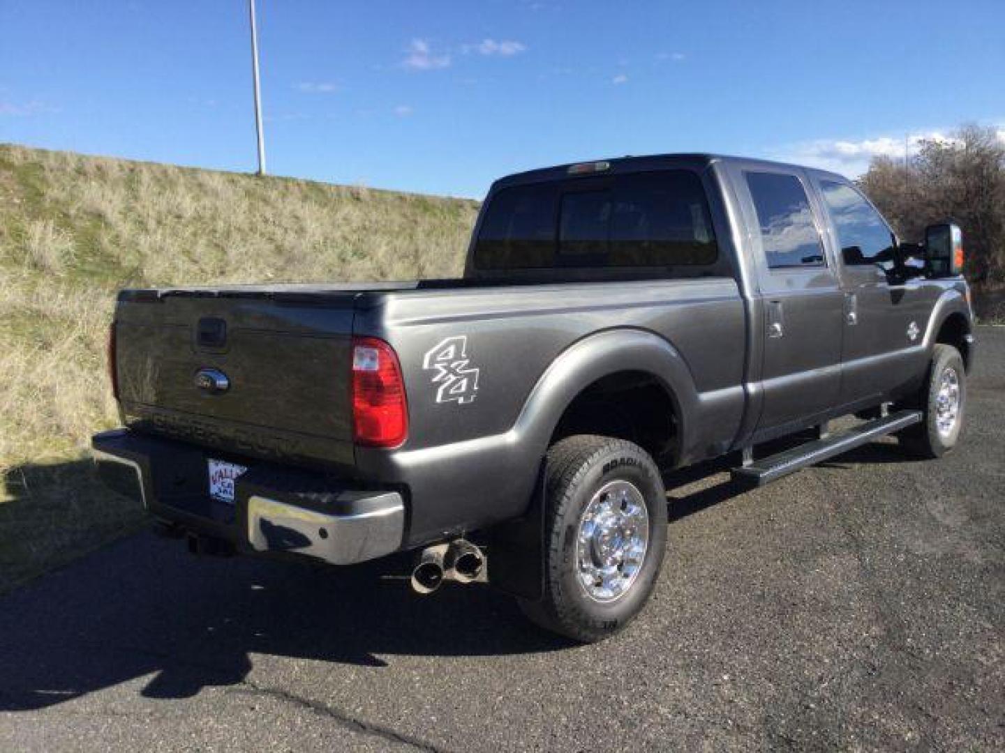 2016 GRAY /BLACK LEATHER Ford F-350 SD Lariat Crew Cab 4WD (1FT8W3BT3GE) with an 6.7L V8 OHV 16V DIESEL engine, 6-Speed Automatic transmission, located at 1801 Main Street, Lewiston, 83501, (208) 743-9371, 46.417065, -117.004799 - Photo#22