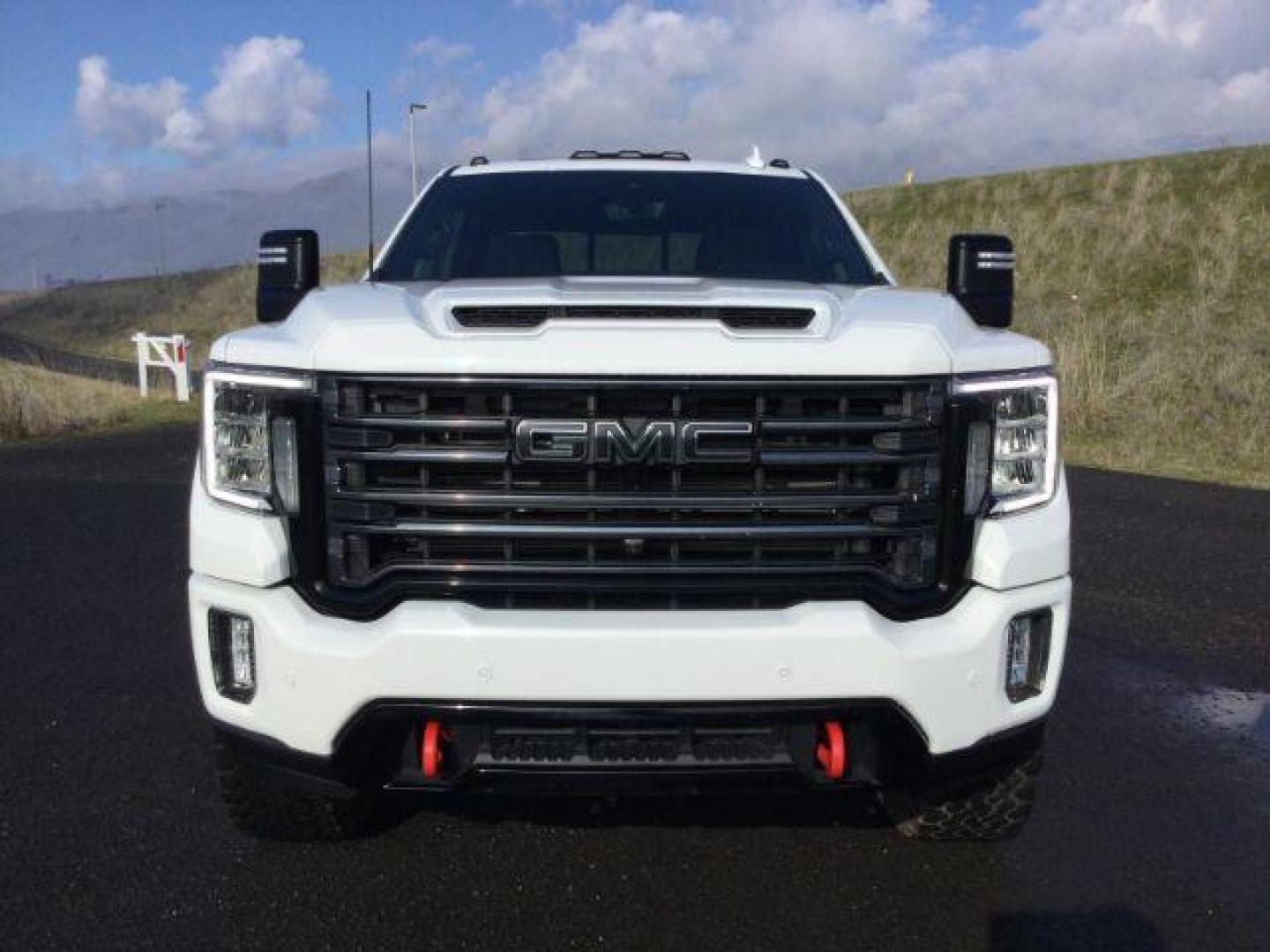 2021 Summit White /Jet Black w/Kalahari Accents GMC Sierra 3500HD AT4 Crew Cab 4WD (1GT49VEY8MF) with an 6.6L V8 OHV 16 DIESEL engine, 10-speed automatic transmission, located at 1801 Main Street, Lewiston, 83501, (208) 743-9371, 46.417065, -117.004799 - Photo#15