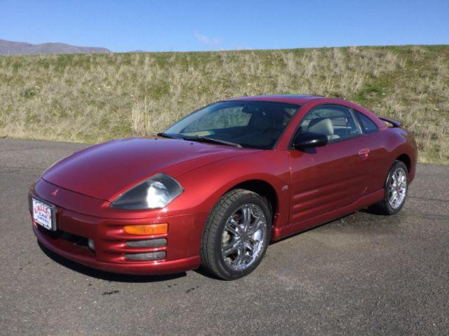 2000 Patriot Red Pearl /Beige Leather Mitsubishi Eclipse GT (4A3AC54L2YE) with an 3.0L V6 SOHC 24V engine, 4-Speed Automatic transmission, located at 1801 Main Street, Lewiston, 83501, (208) 743-9371, 46.417065, -117.004799 - Photo#0