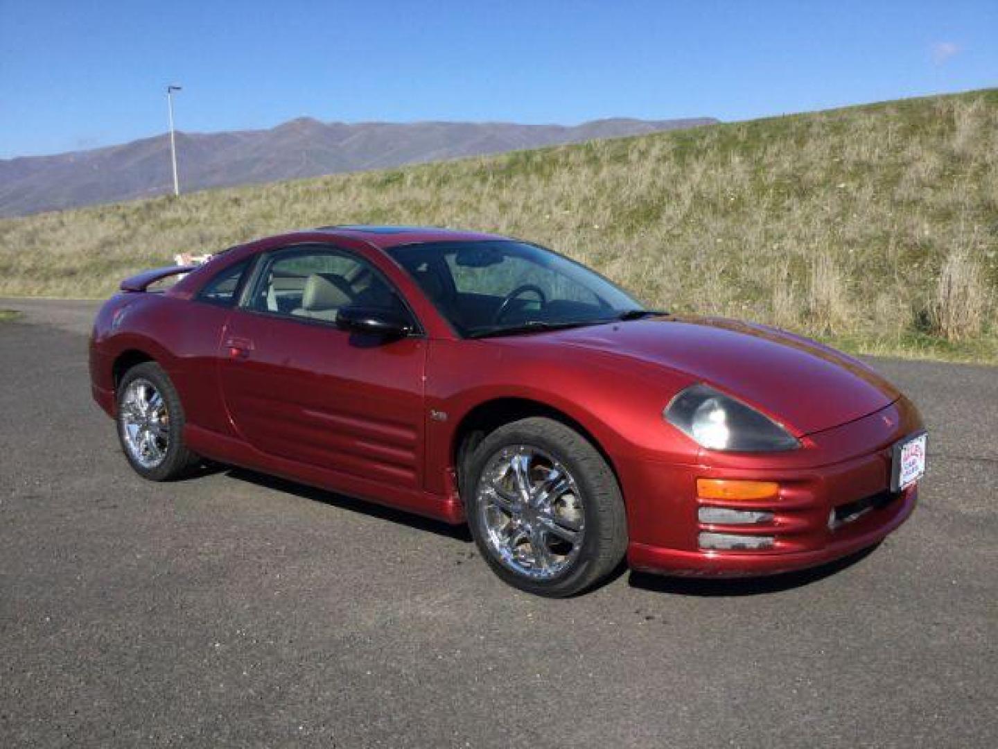 2000 Patriot Red Pearl /Beige Leather Mitsubishi Eclipse GT (4A3AC54L2YE) with an 3.0L V6 SOHC 24V engine, 4-Speed Automatic transmission, located at 1801 Main Street, Lewiston, 83501, (208) 743-9371, 46.417065, -117.004799 - Photo#11