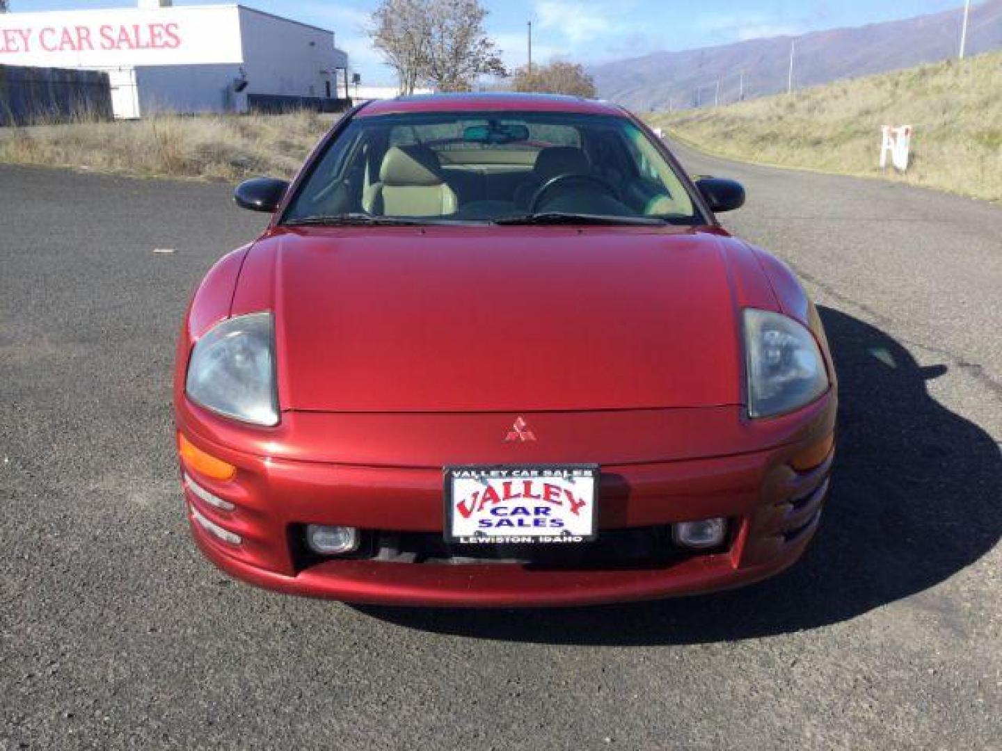 2000 Patriot Red Pearl /Beige Leather Mitsubishi Eclipse GT (4A3AC54L2YE) with an 3.0L V6 SOHC 24V engine, 4-Speed Automatic transmission, located at 1801 Main Street, Lewiston, 83501, (208) 743-9371, 46.417065, -117.004799 - Photo#12