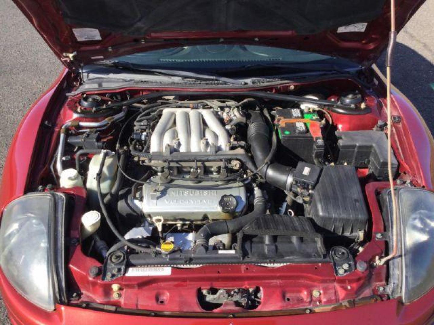 2000 Patriot Red Pearl /Beige Leather Mitsubishi Eclipse GT (4A3AC54L2YE) with an 3.0L V6 SOHC 24V engine, 4-Speed Automatic transmission, located at 1801 Main Street, Lewiston, 83501, (208) 743-9371, 46.417065, -117.004799 - Photo#13