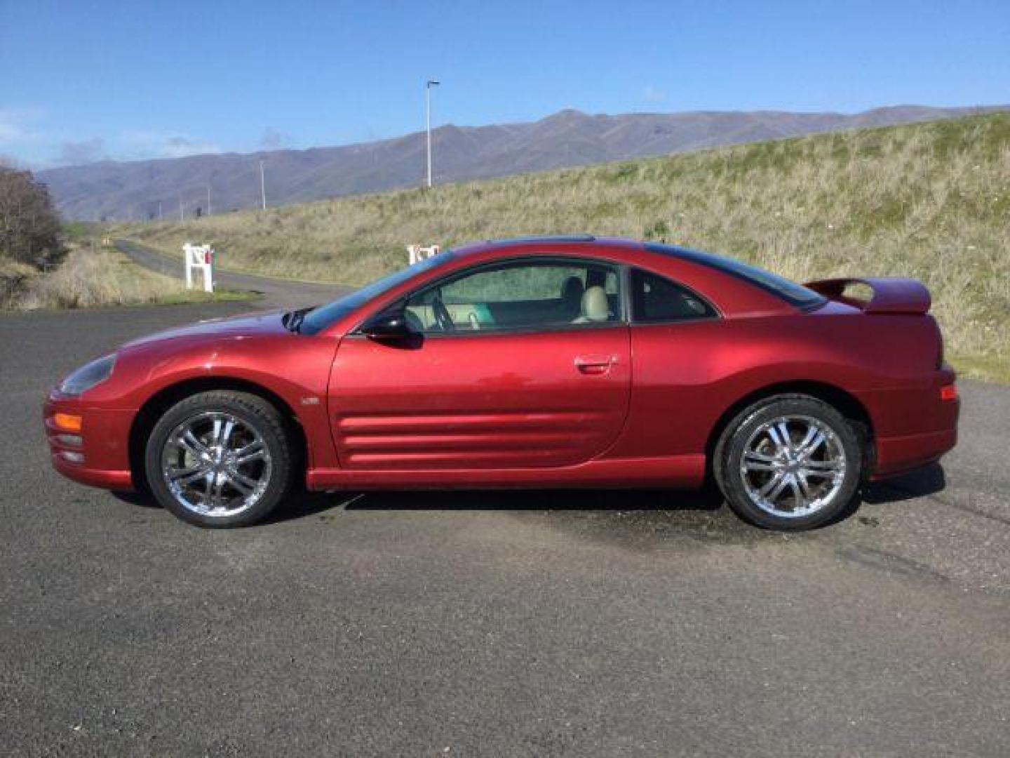 2000 Patriot Red Pearl /Beige Leather Mitsubishi Eclipse GT (4A3AC54L2YE) with an 3.0L V6 SOHC 24V engine, 4-Speed Automatic transmission, located at 1801 Main Street, Lewiston, 83501, (208) 743-9371, 46.417065, -117.004799 - Photo#1