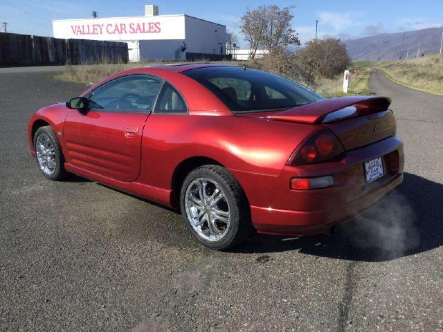 2000 Patriot Red Pearl /Beige Leather Mitsubishi Eclipse GT (4A3AC54L2YE) with an 3.0L V6 SOHC 24V engine, 4-Speed Automatic transmission, located at 1801 Main Street, Lewiston, 83501, (208) 743-9371, 46.417065, -117.004799 - Photo#2