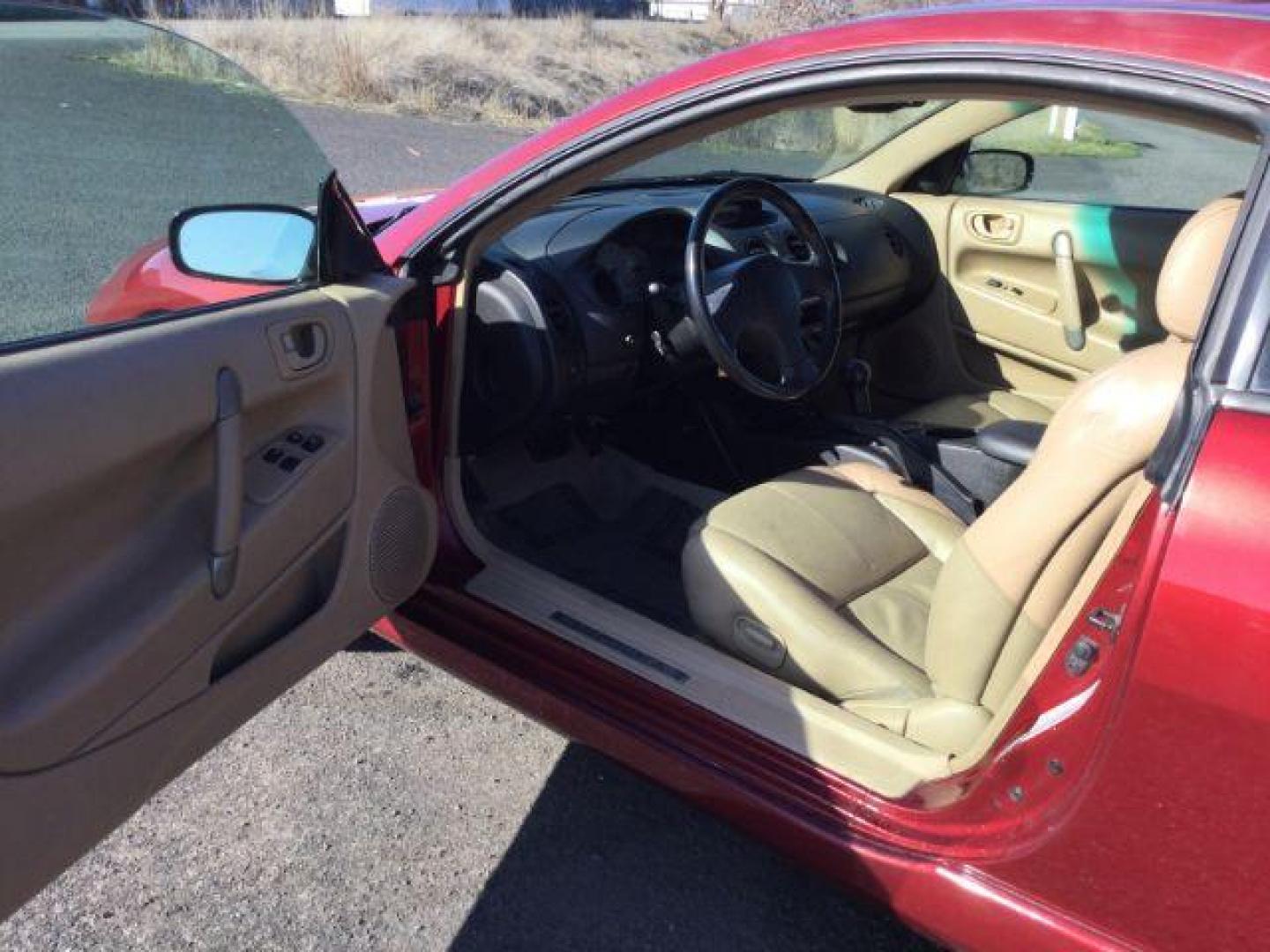 2000 Patriot Red Pearl /Beige Leather Mitsubishi Eclipse GT (4A3AC54L2YE) with an 3.0L V6 SOHC 24V engine, 4-Speed Automatic transmission, located at 1801 Main Street, Lewiston, 83501, (208) 743-9371, 46.417065, -117.004799 - Photo#4